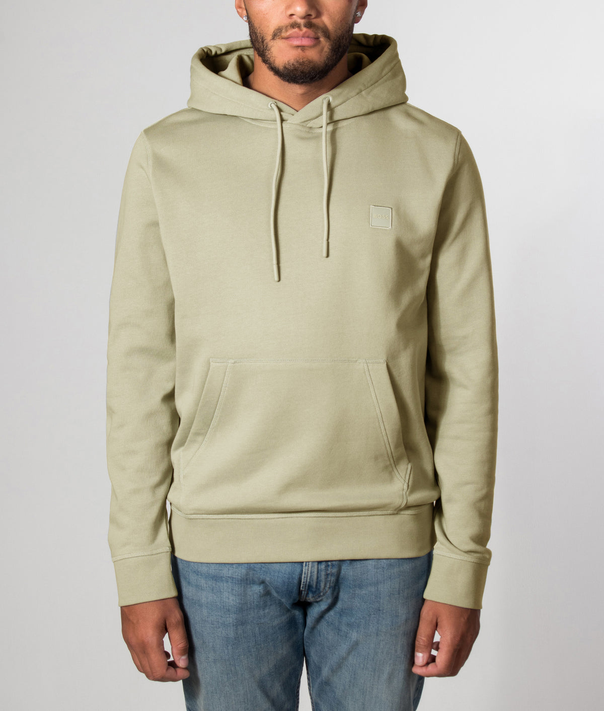 BOSS Regular Fit Wetalk Hoodie in Open Green at EQVVS Menswear. Front model shot.