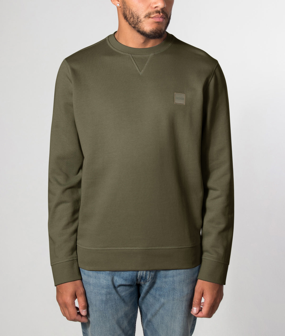 BOSS Westart Sweatshirt in Bright Green at EQVVS Menswear. Front model shot.