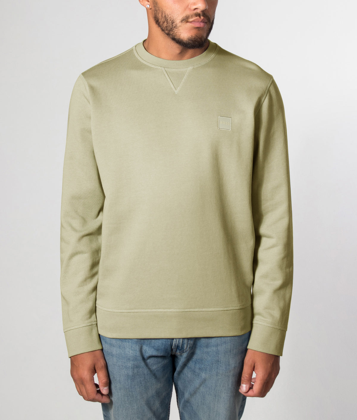BOSS Regular Fit Westart Sweatshirt in Open Green at EQVVS Menswear. Front model shot.