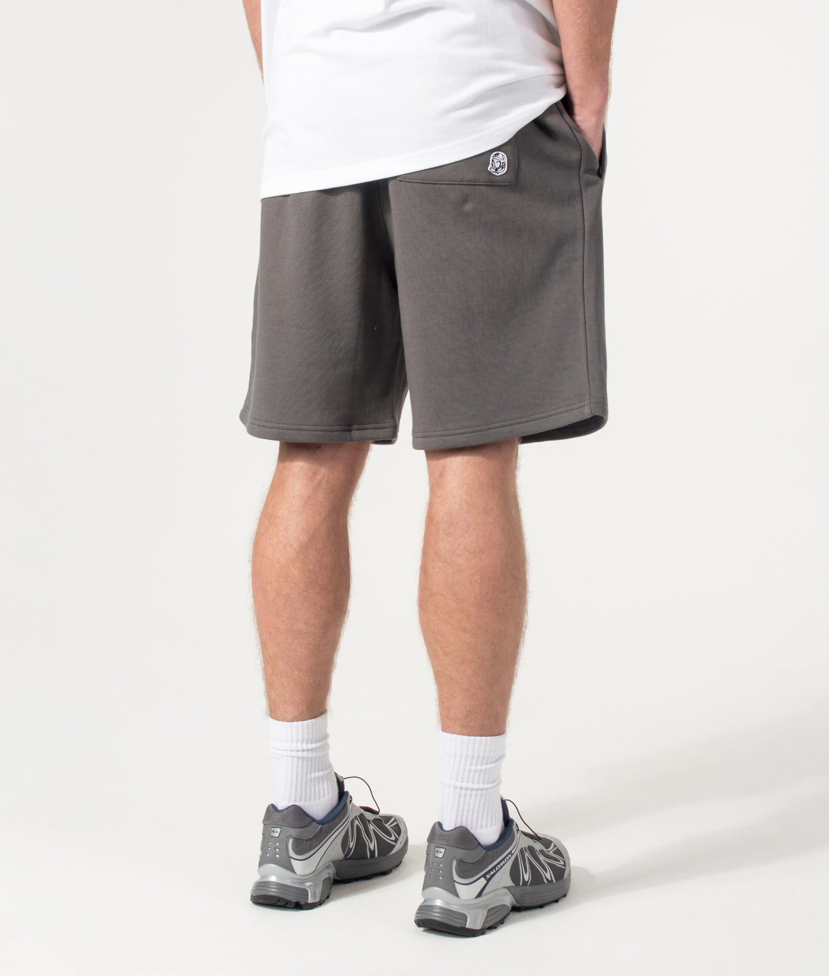 Billionaire Boy's Club Small Arch Logo Sweat Shorts in Space Grey at EQVVS Menswear. Model back shot.