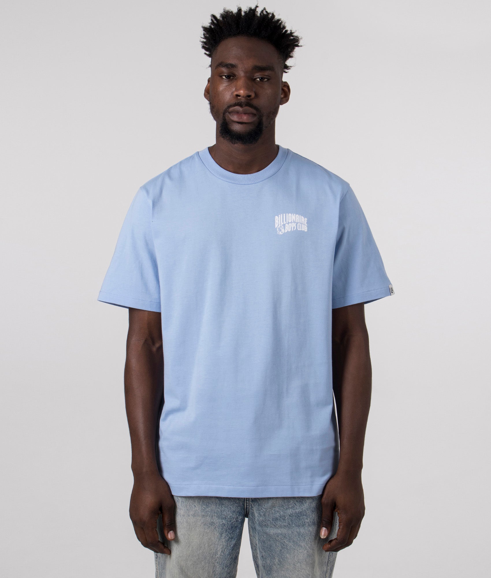 Billionaire Boy's Club Small Arch Logo T-Shirt in Blue. Front angle model shot at EQVVS