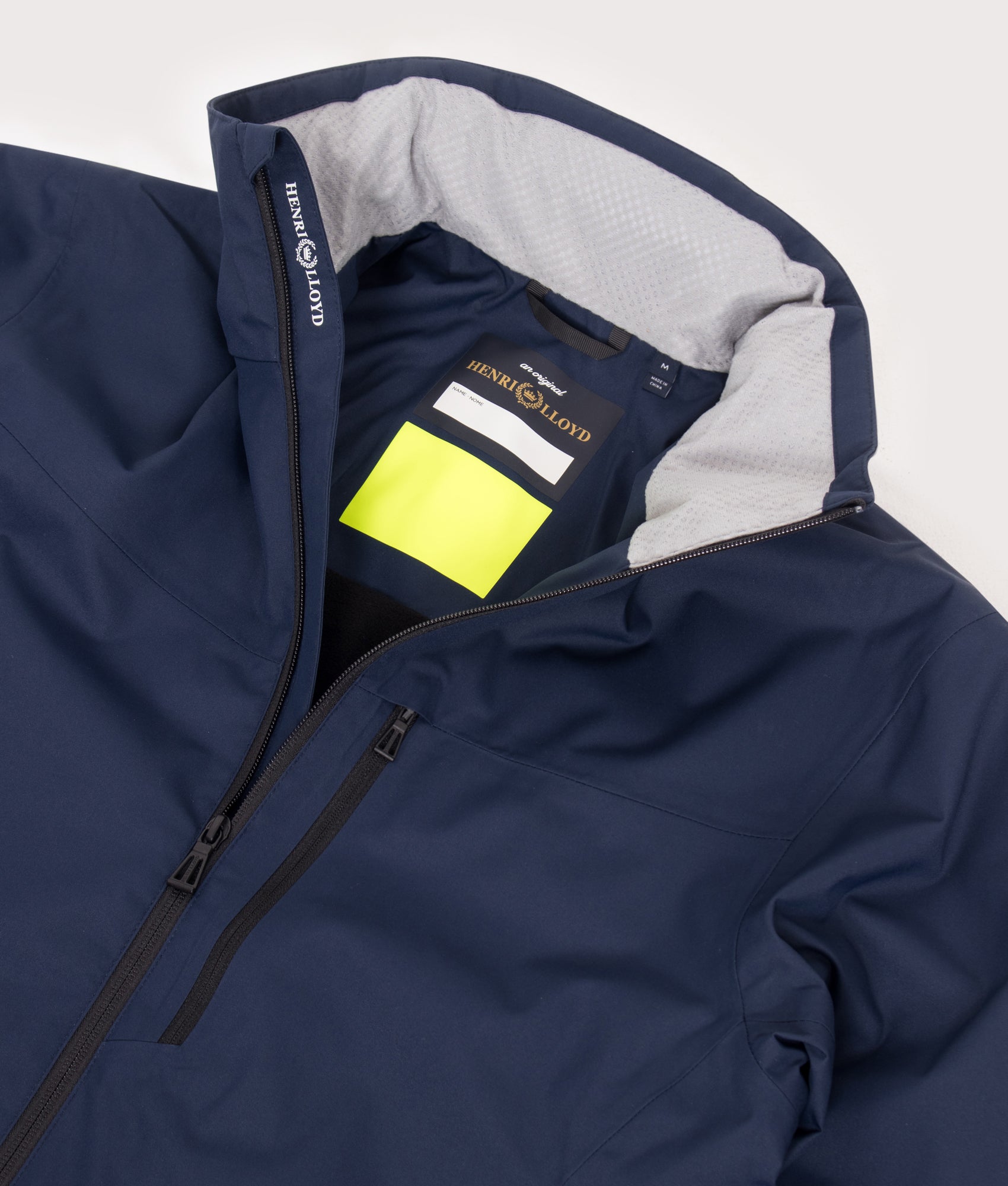 Cool Breeze Jacket in Navy Blue by Henri-Lloyd. Shot by EQVVS. Flat detail shot.