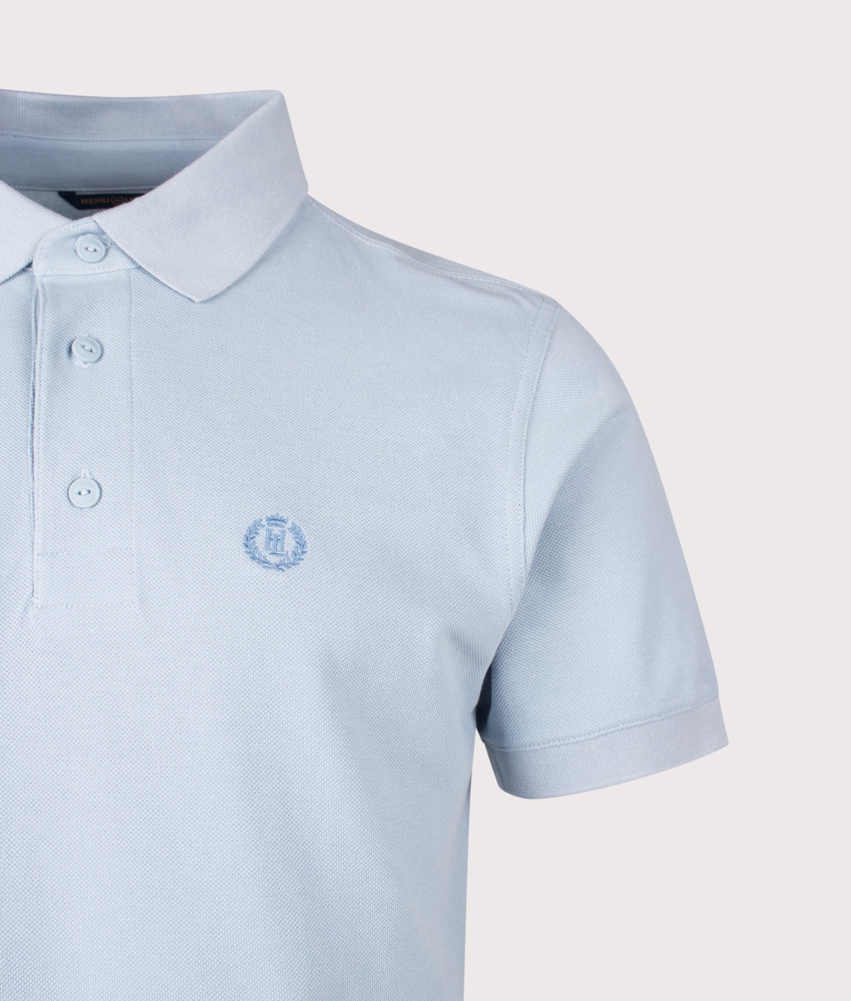 Falmouth Polo Shirt in Fog Blue by Henri-Lloyd. Shot by EQVVS. Detail shot.
