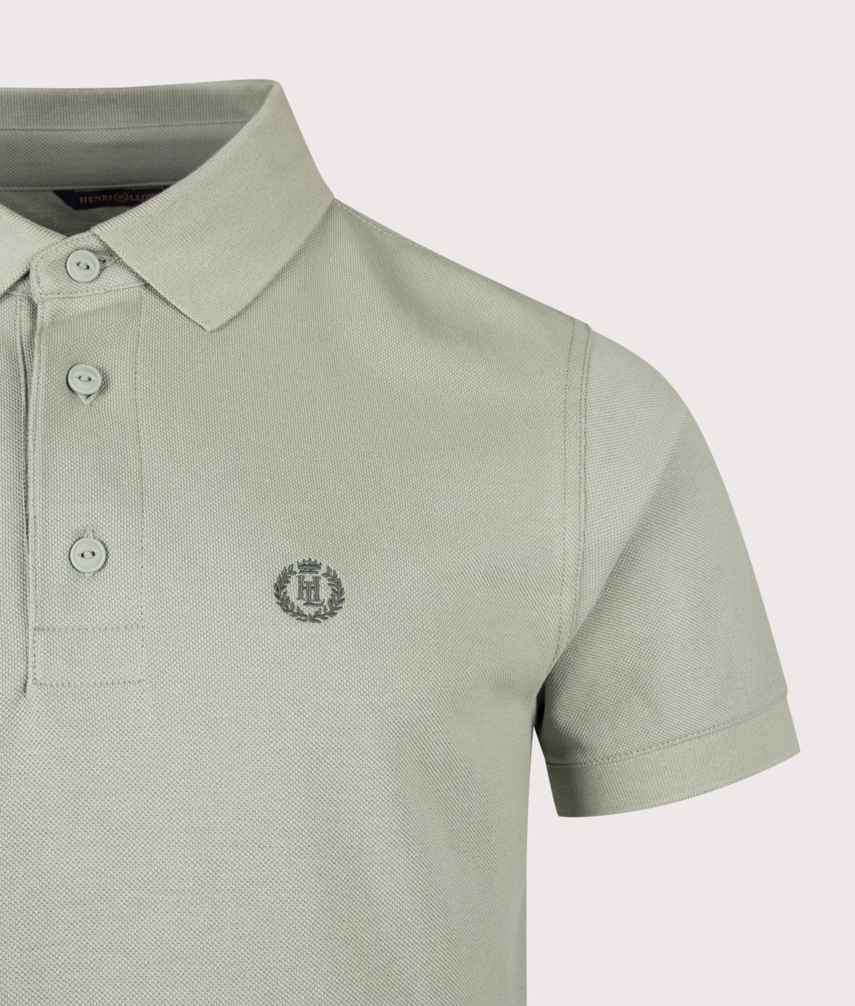 Henri-Lloyd Falmouth Polo Shirt in Pale Jade at EQVVS Menswear. Detail shot.
