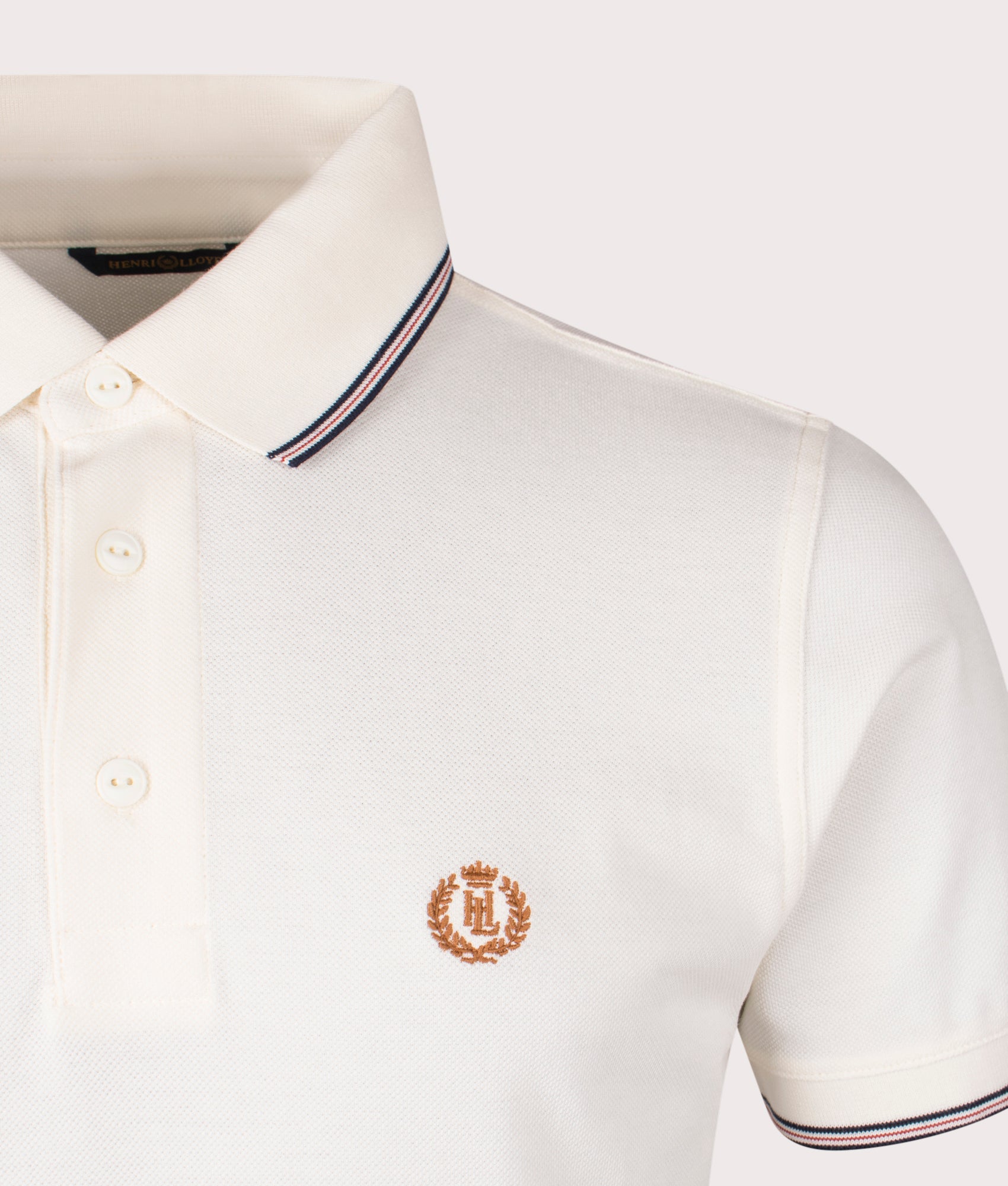 Henri Lloyd Penryn Polo Shirt in Off White at EQVVS. Detail Shot.