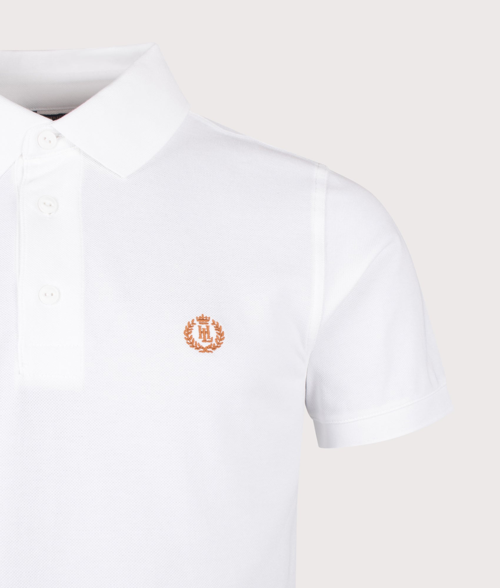 Henri-Lloyd Falmouth Polo Shirt in White at EQVVS Menswear. Detail shot.