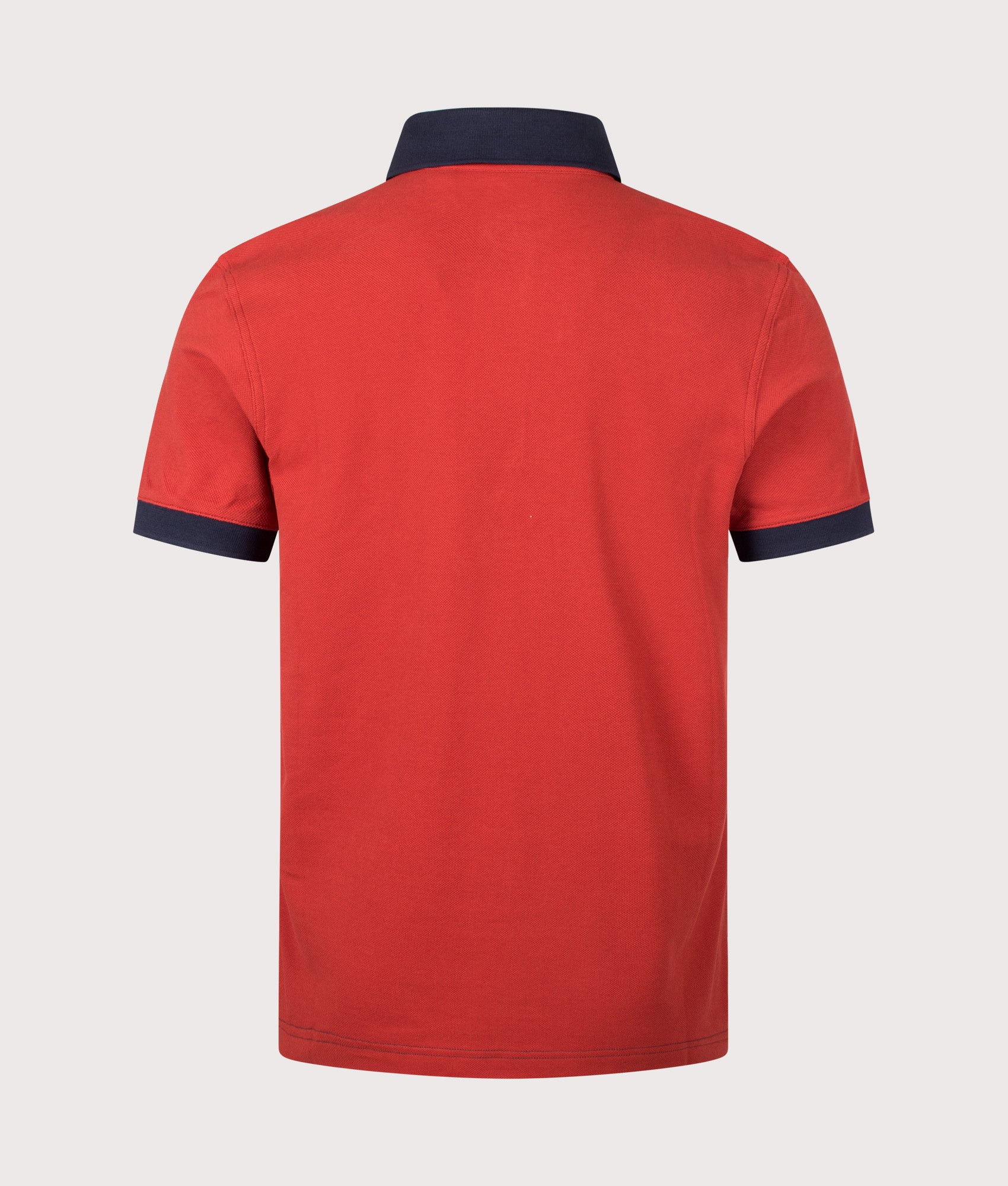 Nautique Polo Shirt in Freo Red/Off White by Henri-Lloyd. Shot by EQVVS. Back shot.