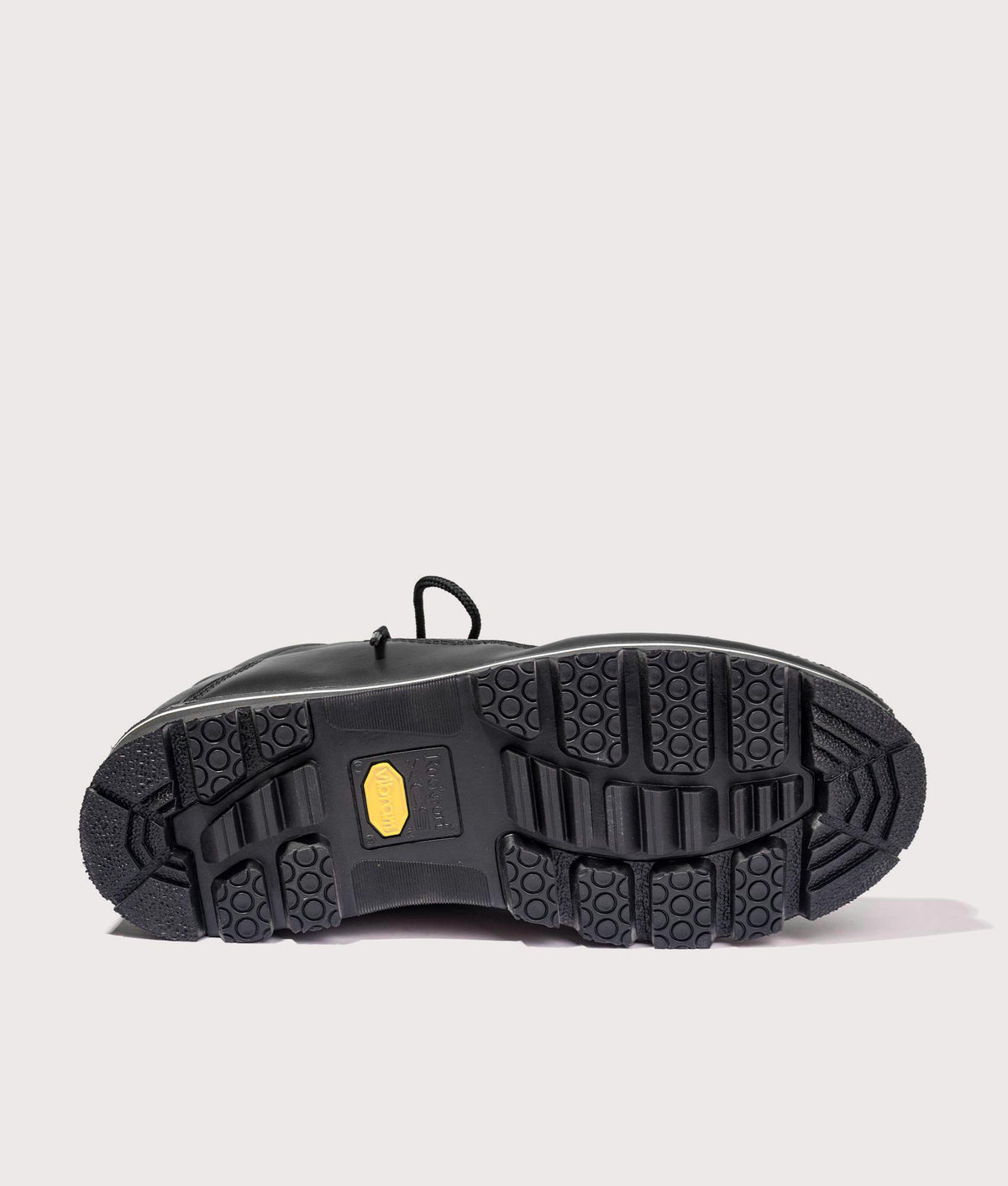 Rockport Umbwe Millennium Anniversary Hiker Boots in Black at EQVVS Menswear. Tread shot.