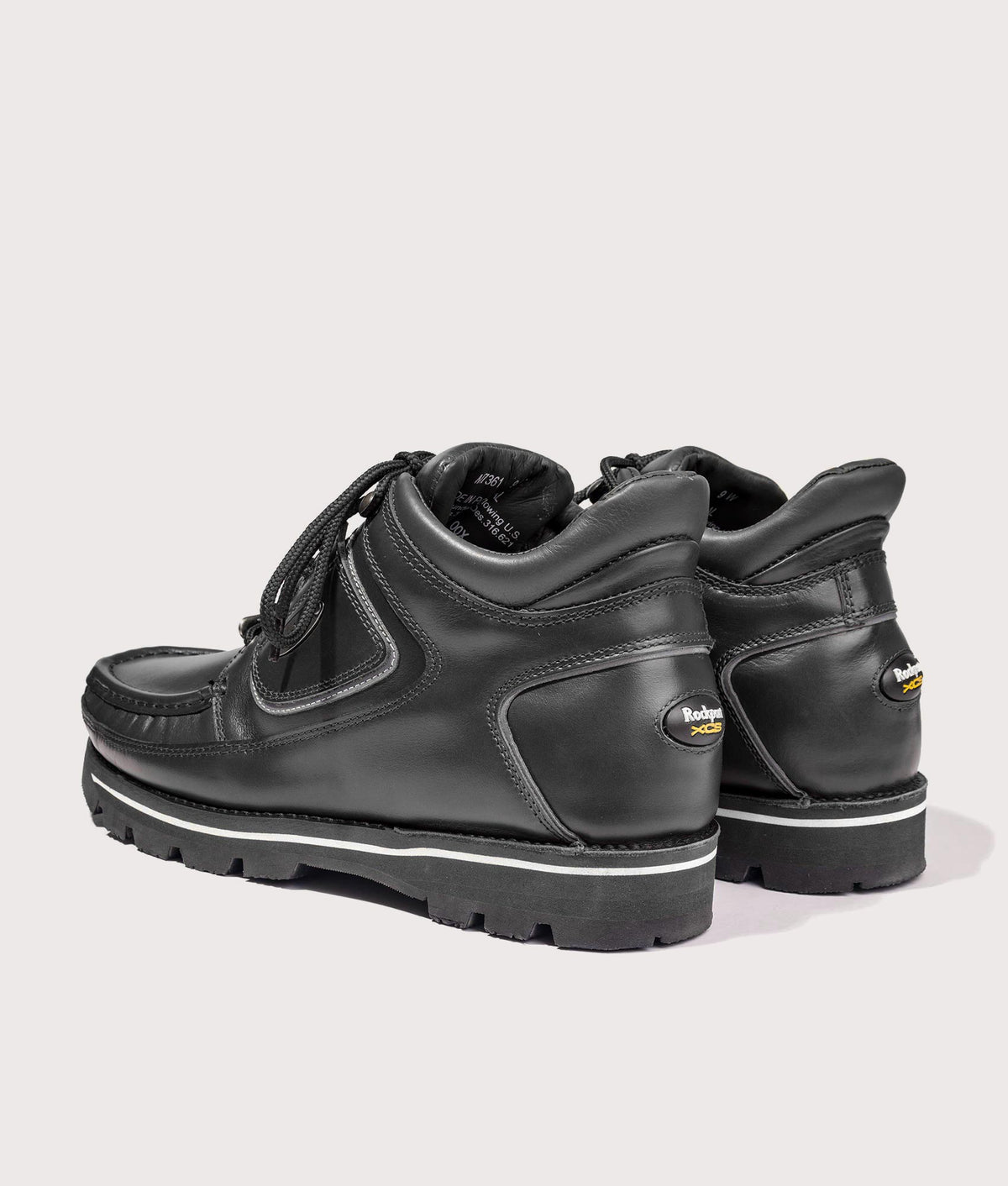 Rockport Umbwe Millennium Anniversary Hiker Boots in Black at EQVVS Menswear. Back shot.