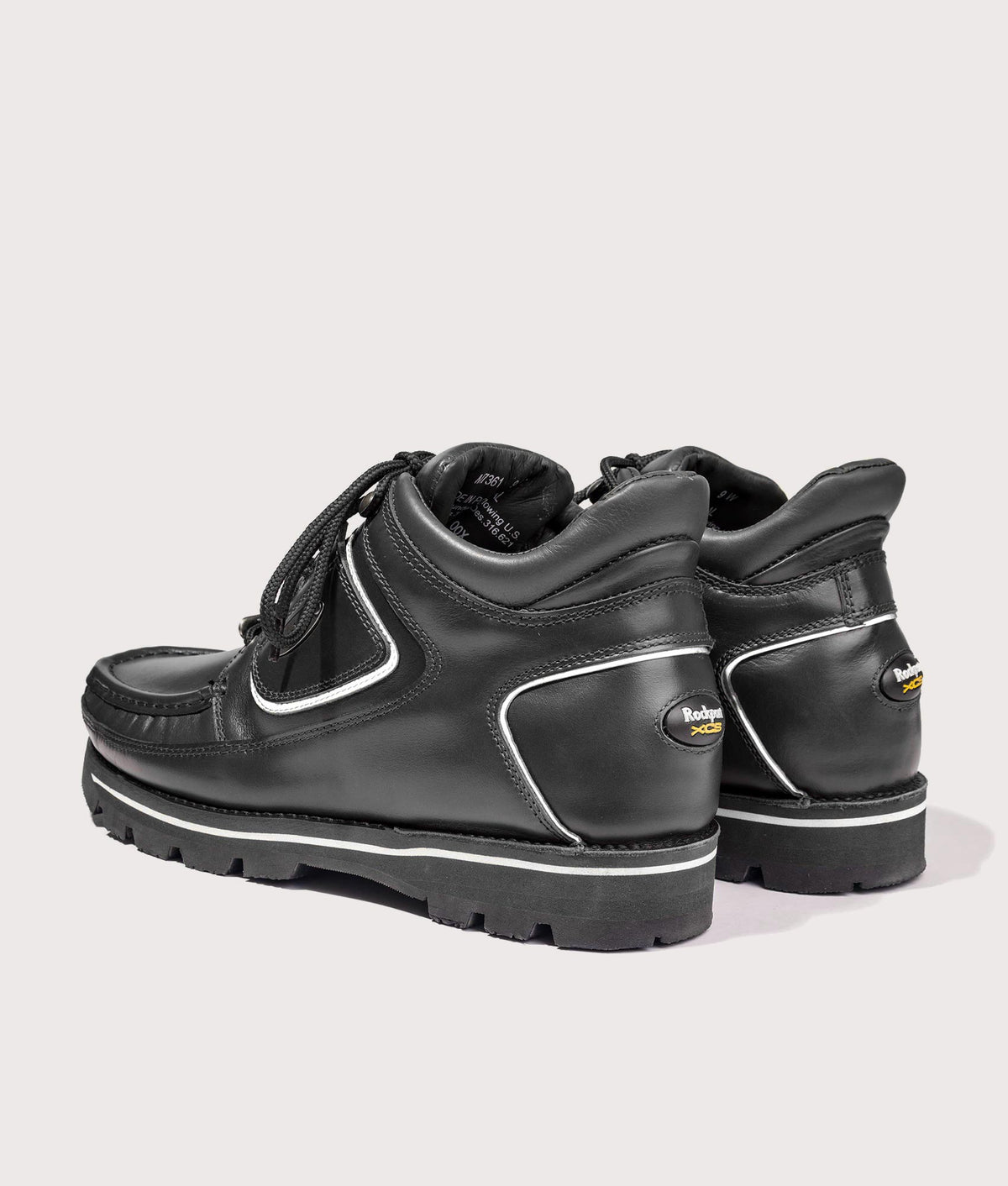 Rockport Umbwe Millennium Anniversary Hiker Boots in Black at EQVVS Menswear. Reflective back shot.