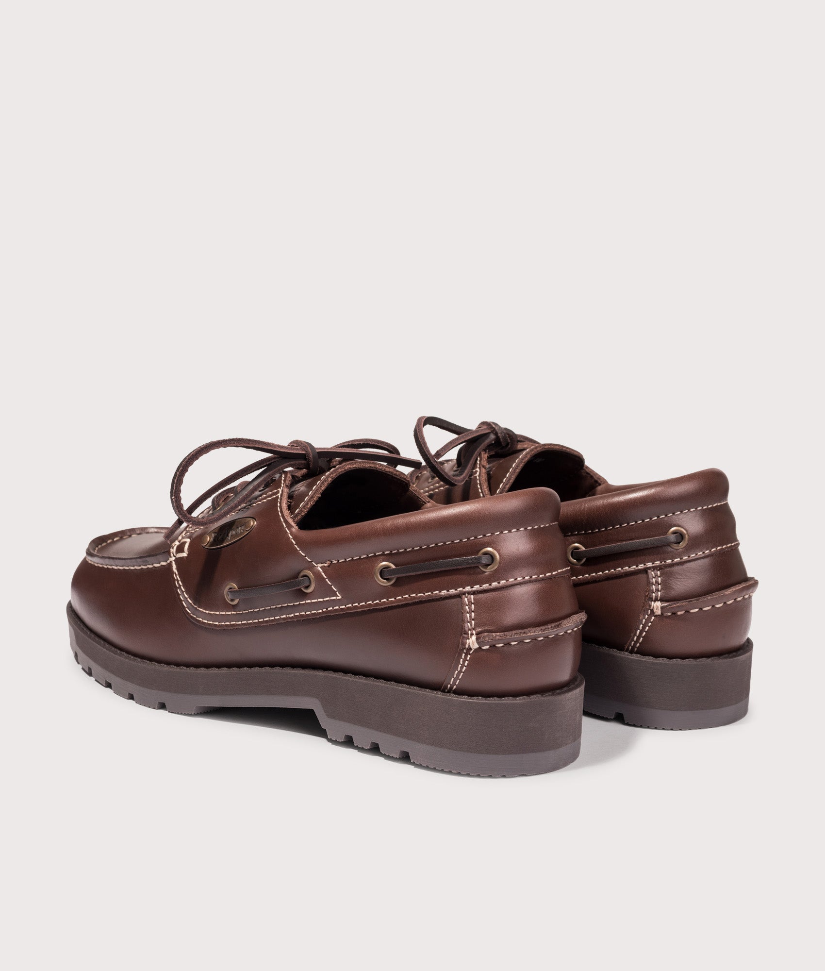 Rockport Country Boat Shoes in Chocolate at EQVVS Menswear. Angled back shot.