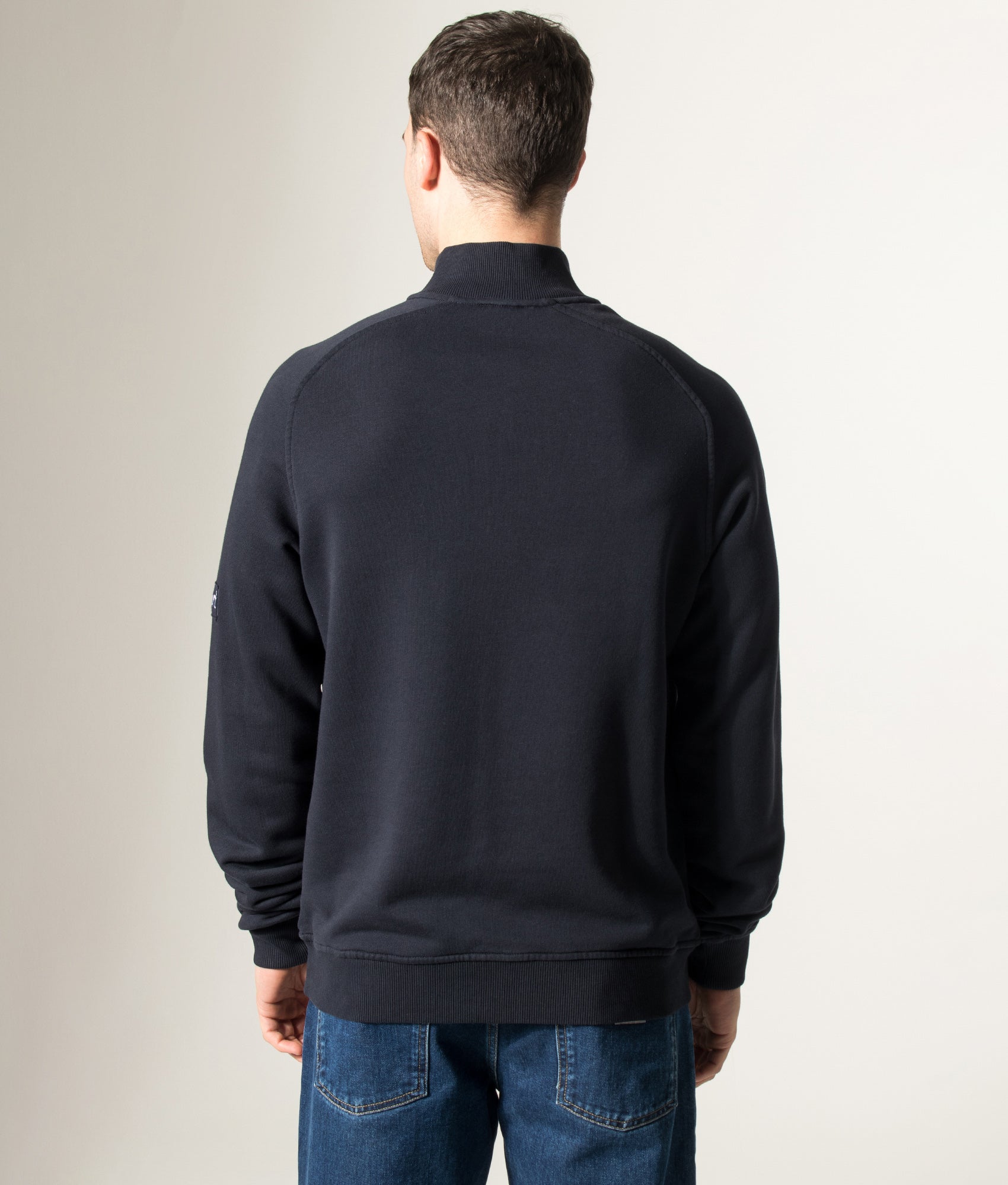 Rockport Relaxed Fit Boston Logo Quarter Zip Sweatshirt in Navy at EQVVS Menswear. Model back shot.