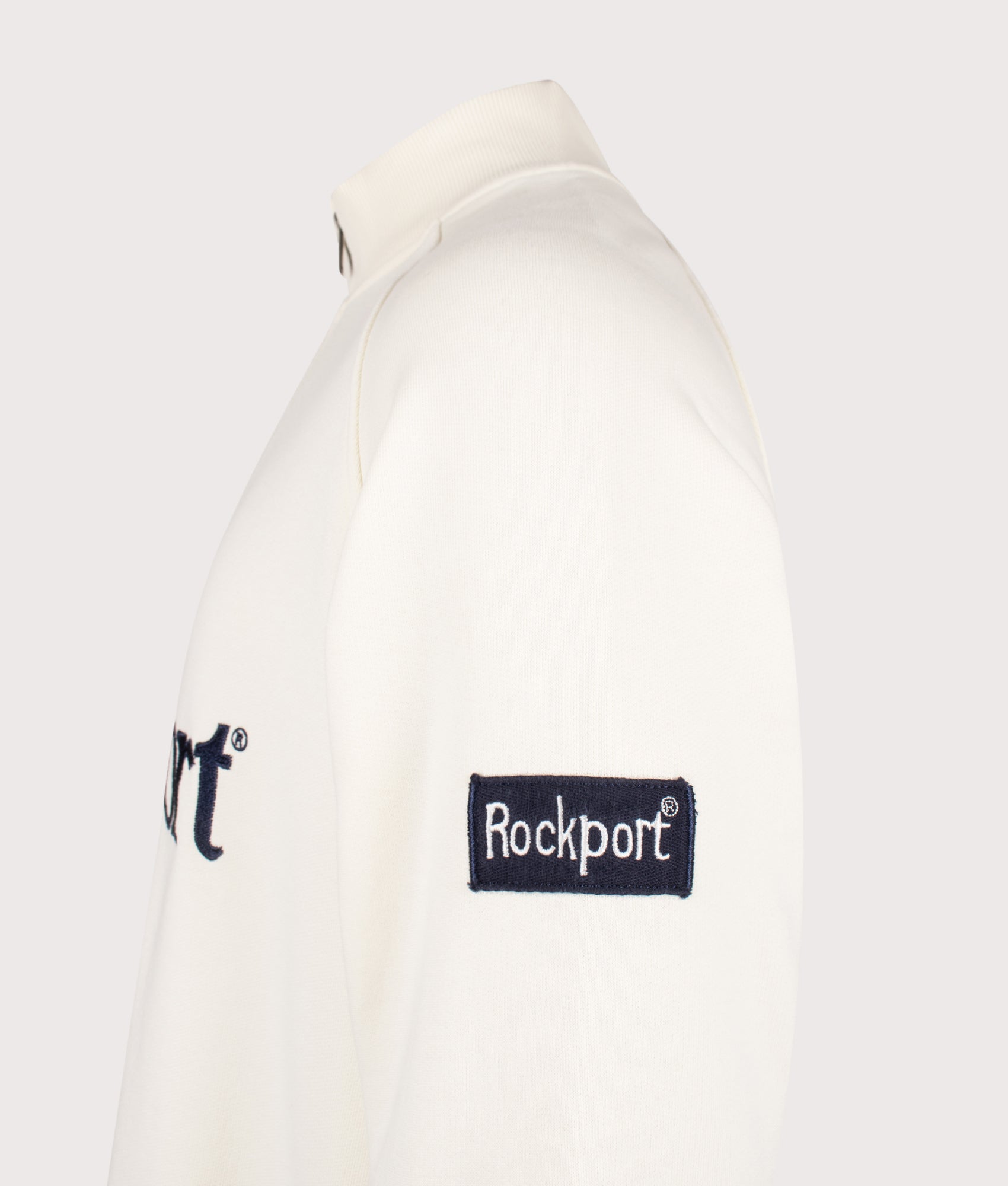 Rockport Relaxed Fit Boston Logo Quarter Zip Sweatshirt in Ecru at EQVVS Menswear. Detail shot.