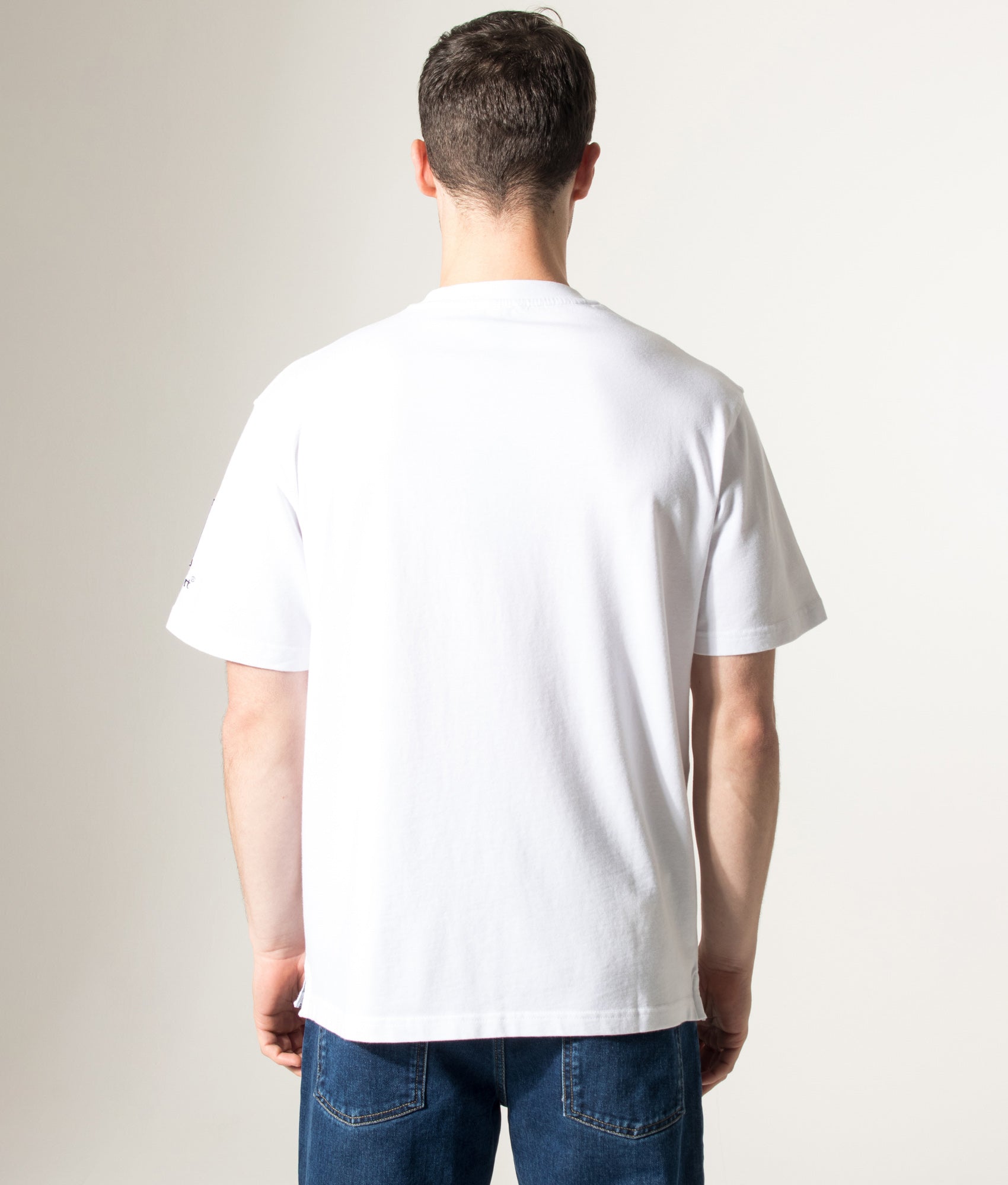Rockport Relaxed Fit Highland Front Logo Washed T-Shirt in White at EQVVS Menswear. Model back shot.