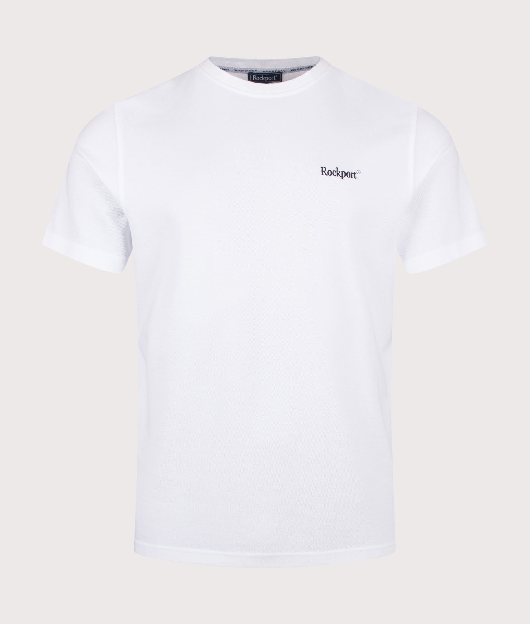 Rockport Relaxed Fit Rocester Piqué Logo T-Shirt in White at EQVVS Menswear. Front shot.