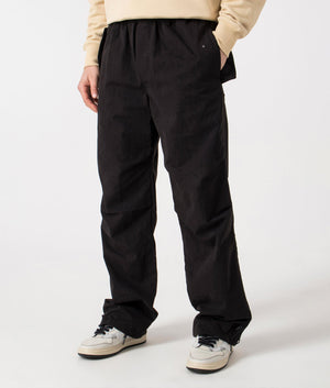 REPRESENT Parachute Pants in black, angle shot. EQVVS