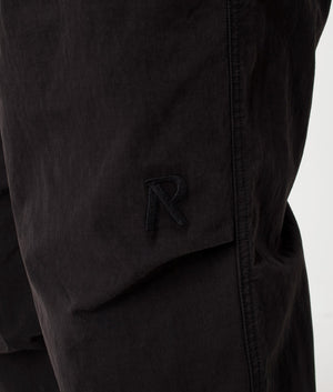 REPRESENT Parachute Pants in black, detail shot. EQVVS
