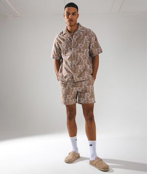 REPRESENT Embroidered Initial Tailored Shorts Washed Taupe EQVVS. Campaign shot;