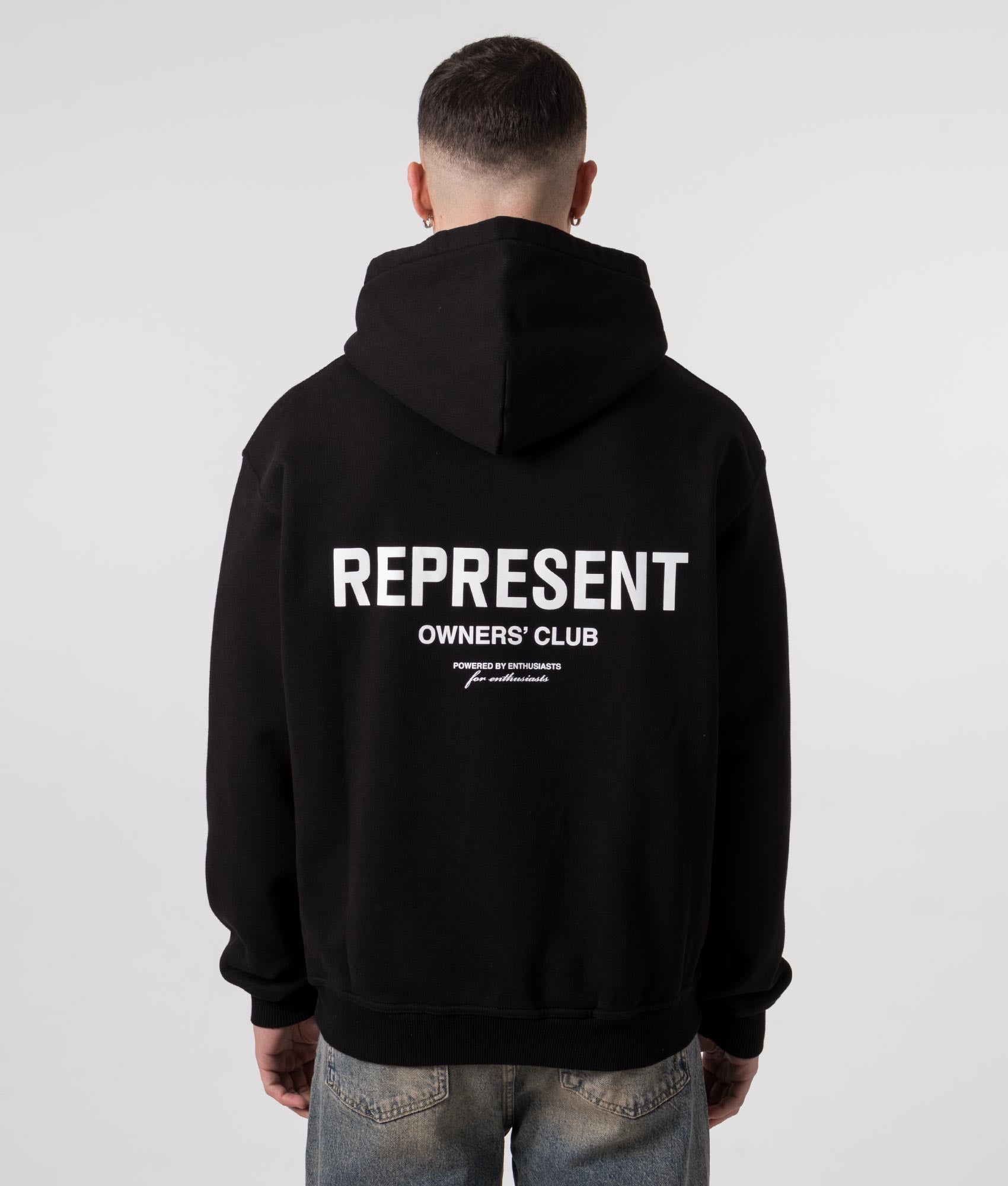 Represent owners club hoodie in black at EQVVS Menswear. Model back shot.