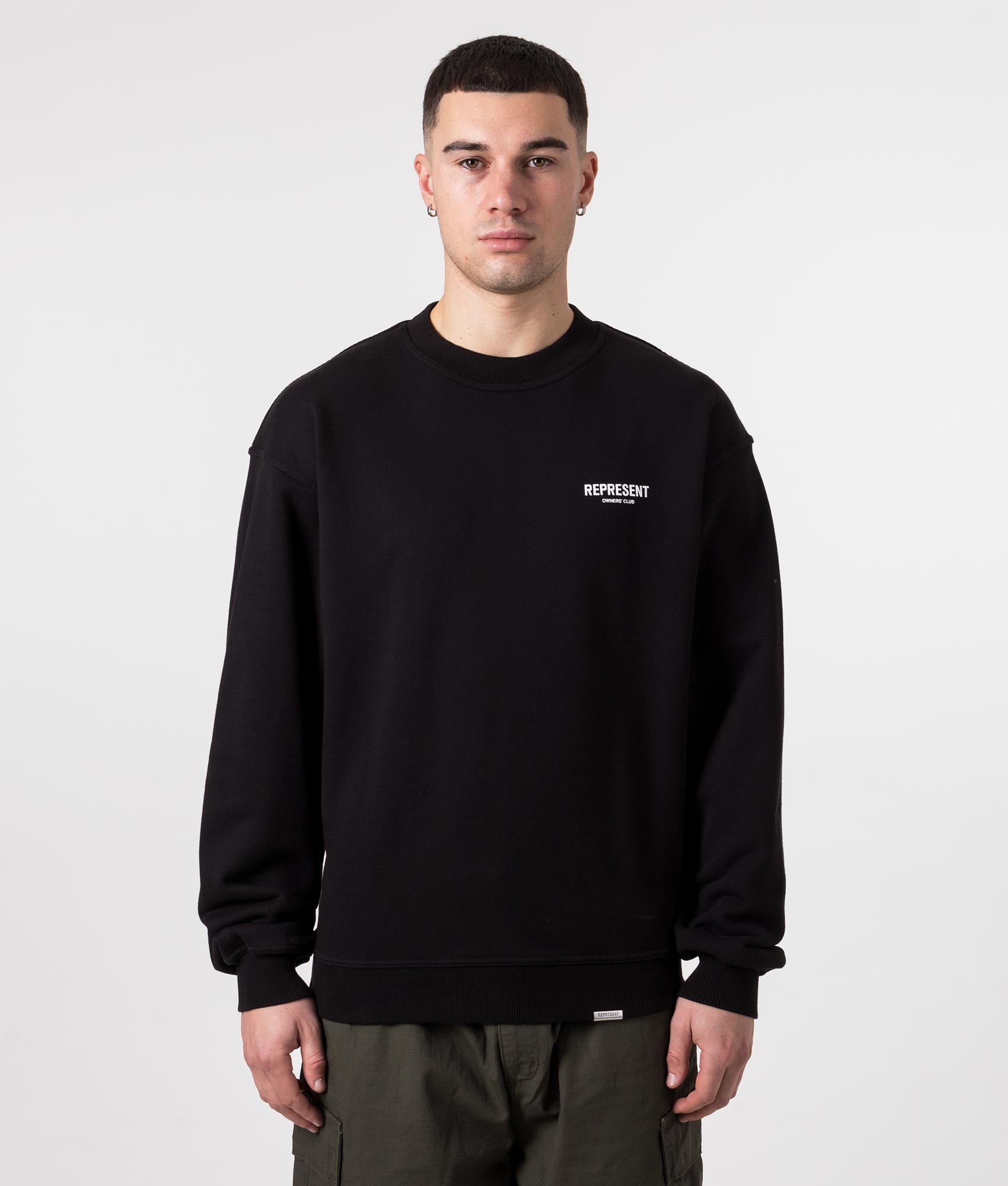 Represent Owners Club Sweatshirt in Black at EQVVS Menswear. Model front shot.