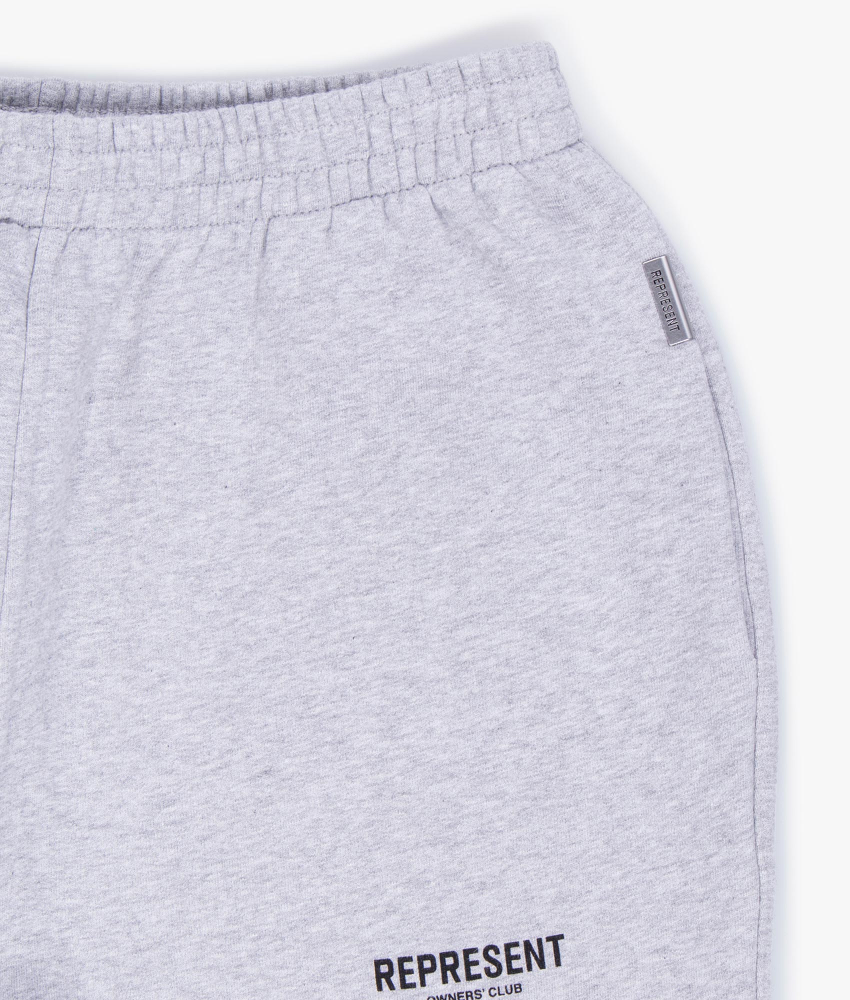 REPRESENT Owners Club Joggers in Ash Grey at EQVVS Menswear. Front detail shot.