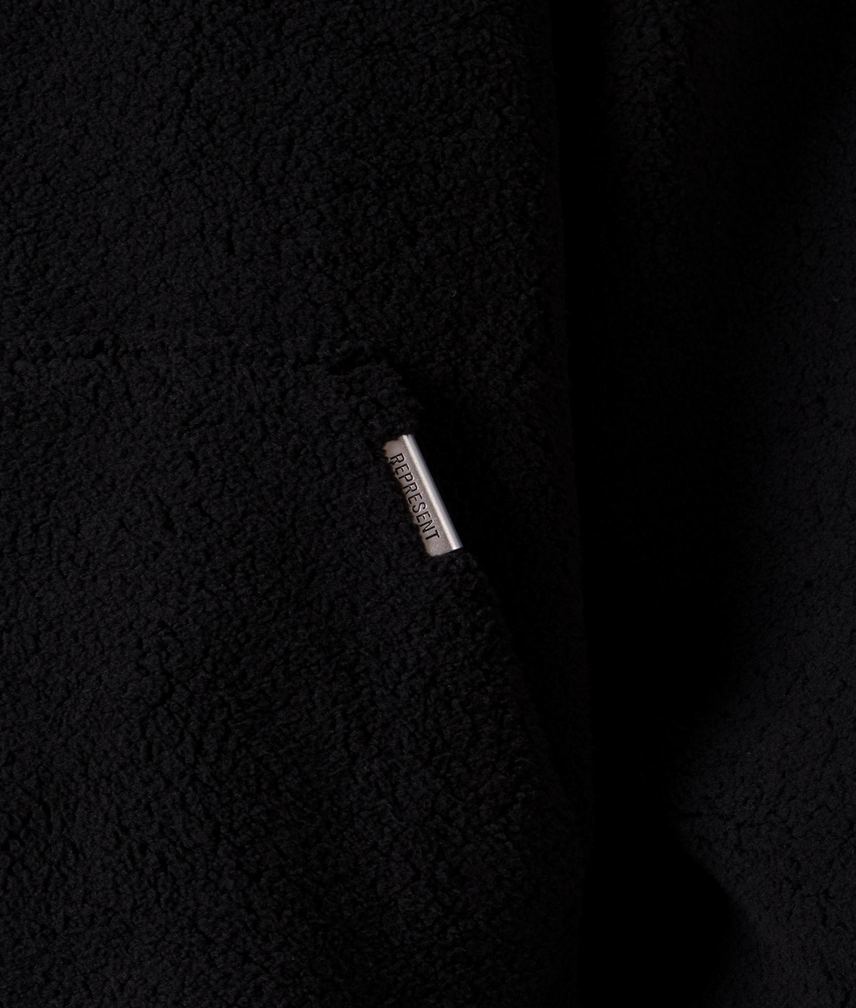 Fleece Oversized Hoodie in Black by Represent. EQVVS Model Shot. 