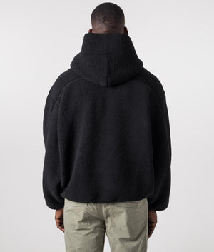 Fleece Oversized Hoodie in Black by Represent. EQVVS Model Shot. 