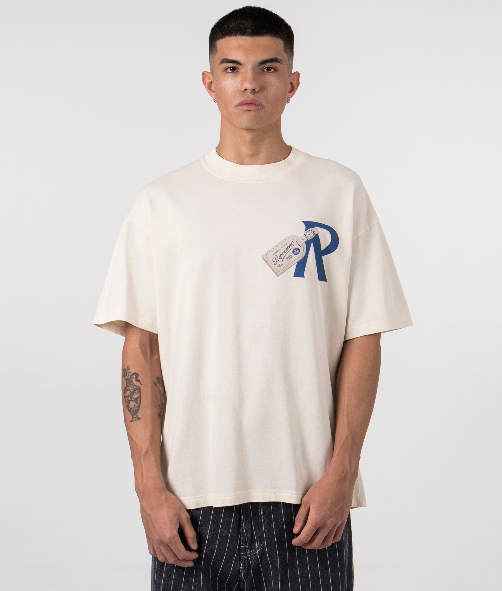 Luggage Tag T-Shirt in Antique White by Represent. EQVVS Model Shot.