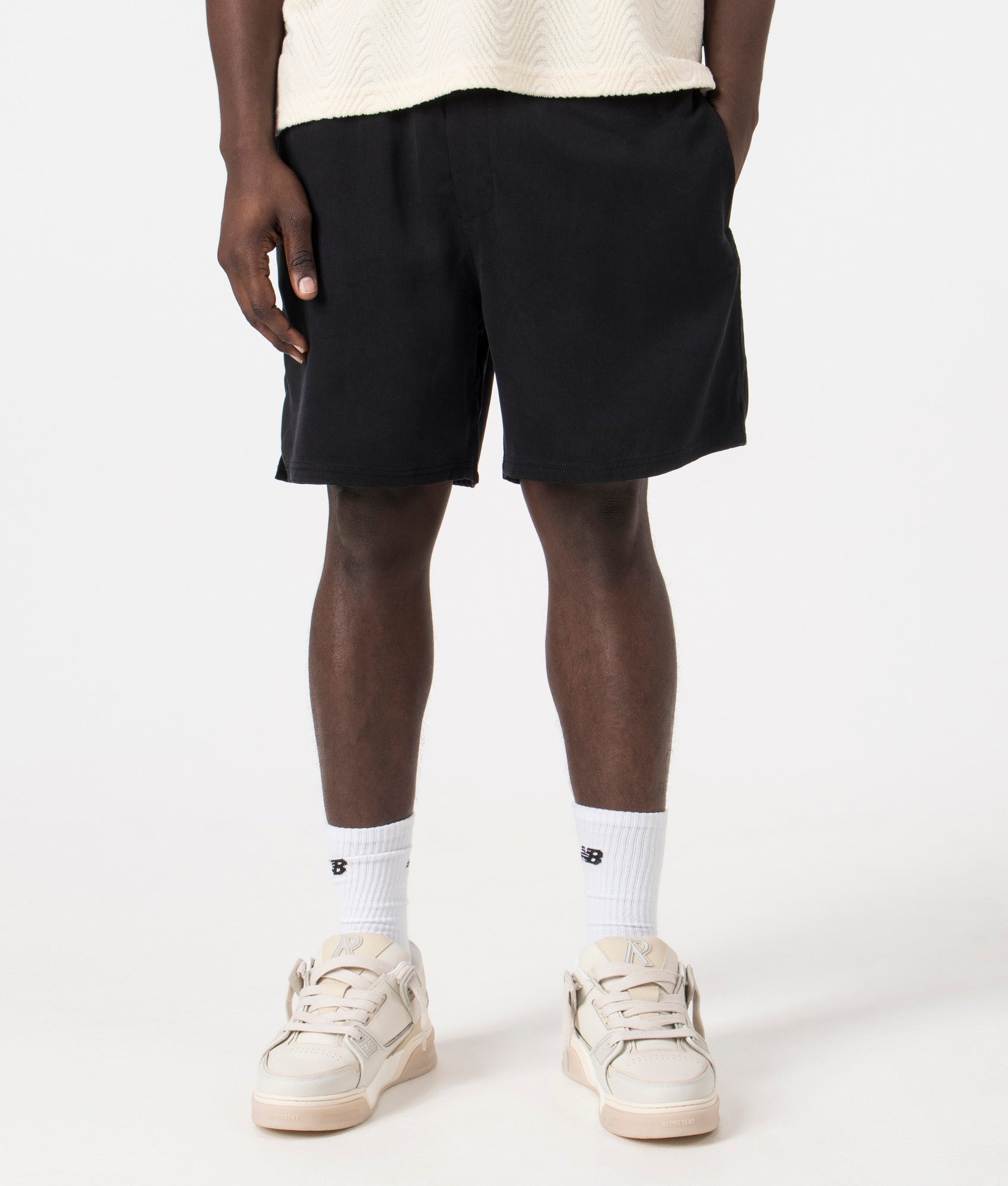 Resort Shorts in Black by Represent. EQVVS Model Shot.