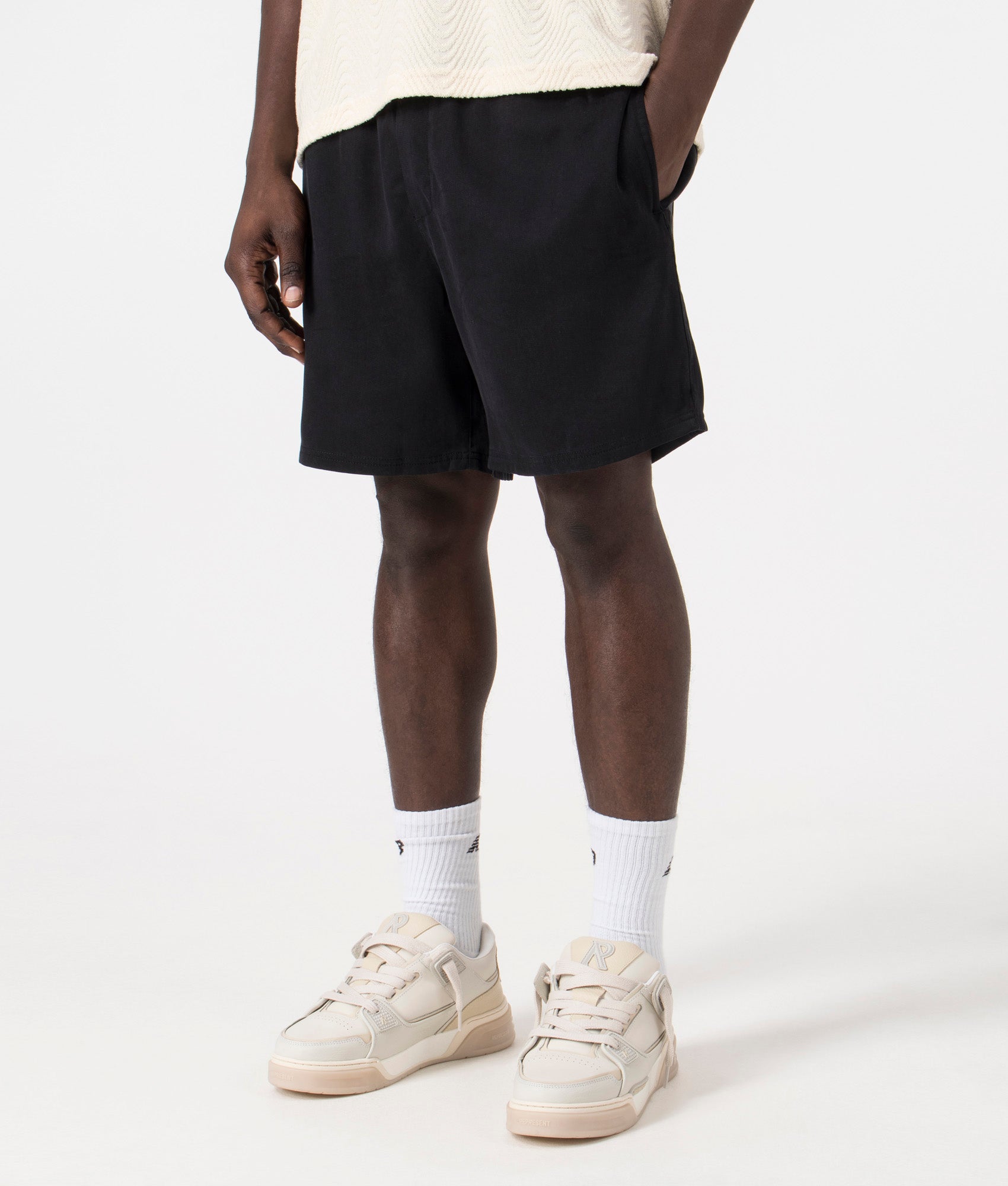 Resort Shorts in Black by Represent. EQVVS Model Shot. 