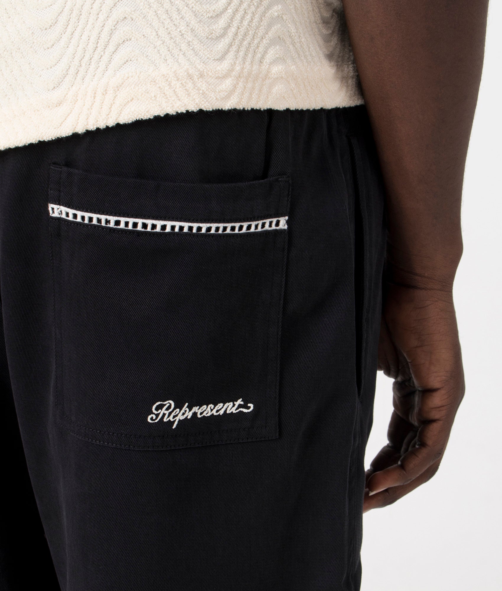 Resort Shorts in Black by Represent. EQVVS Model Shot.