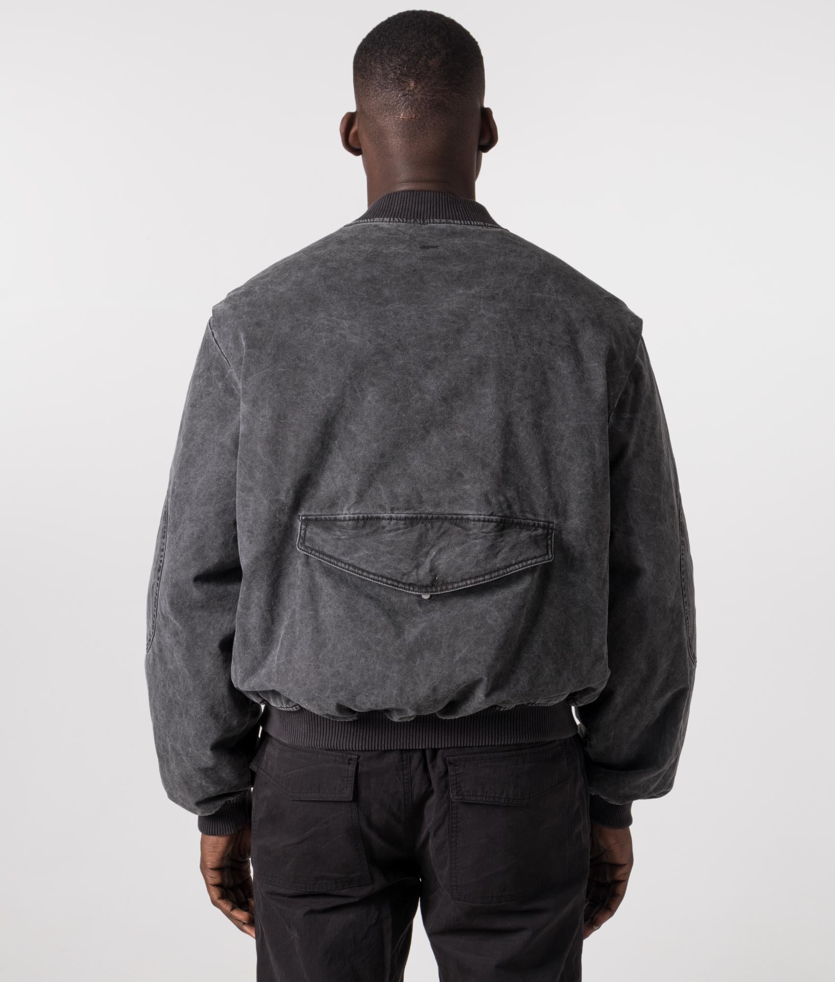 Inset Sleeve Bomber Jacket in Stained Black by Represent. EQVVS Model Shot. 