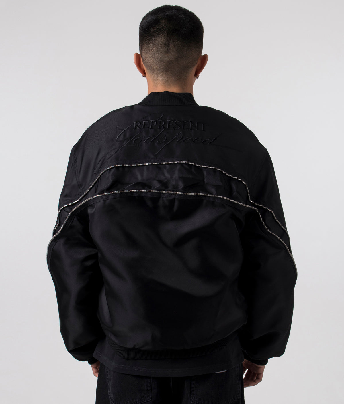 Zip Back Bomber Jacket in Jet Black by Represent. EQVVS Menswear Detail Back Model Shot. 
