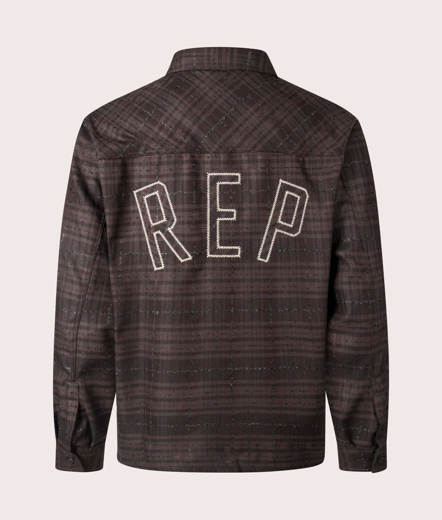 Oversized Rep Flannel Shirt in Coffee from REPRESENT. Back angle shot at EQVVS.