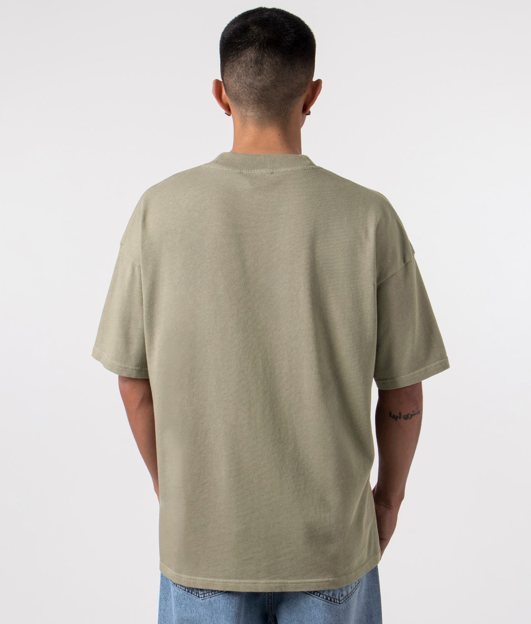 Oversized Thoroughbred T-Shirt in Khaki by Represent. EQVVS Menswear Back Model Shot. 