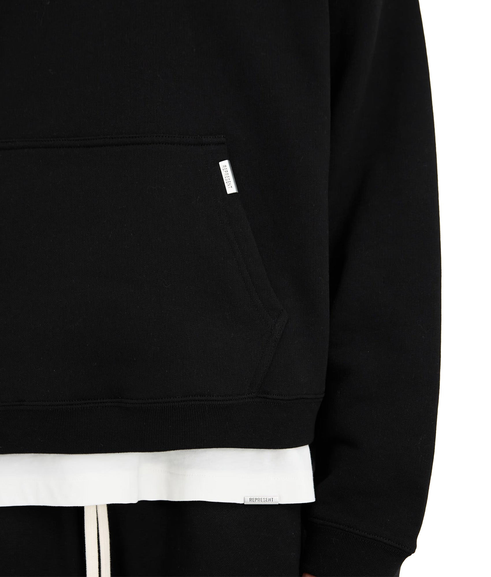 REPRESENT Initial Boxy Oversized Hoodie in black at EQVVS Menswear. Detail shot.