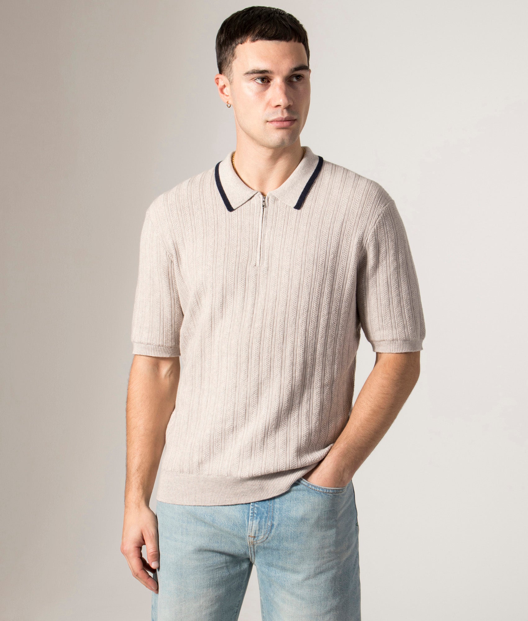 Bury Quarter Zip Knit Polo Shirt by Wax London in Natural Melange. Shot by EQVVS. Front model shot.