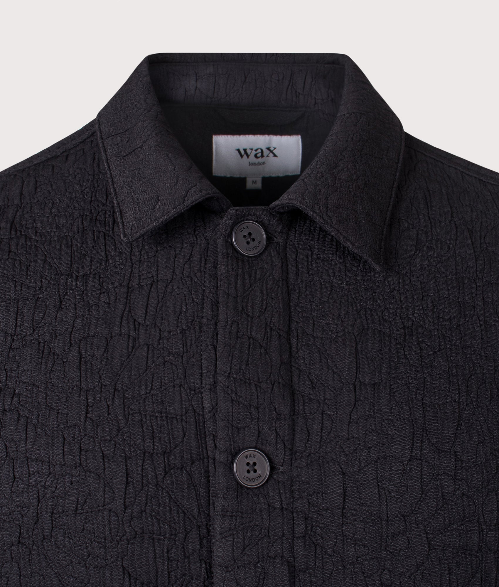 Wax London Rockley Overshirt in Black at EQVVS Menswear. Detail shot.