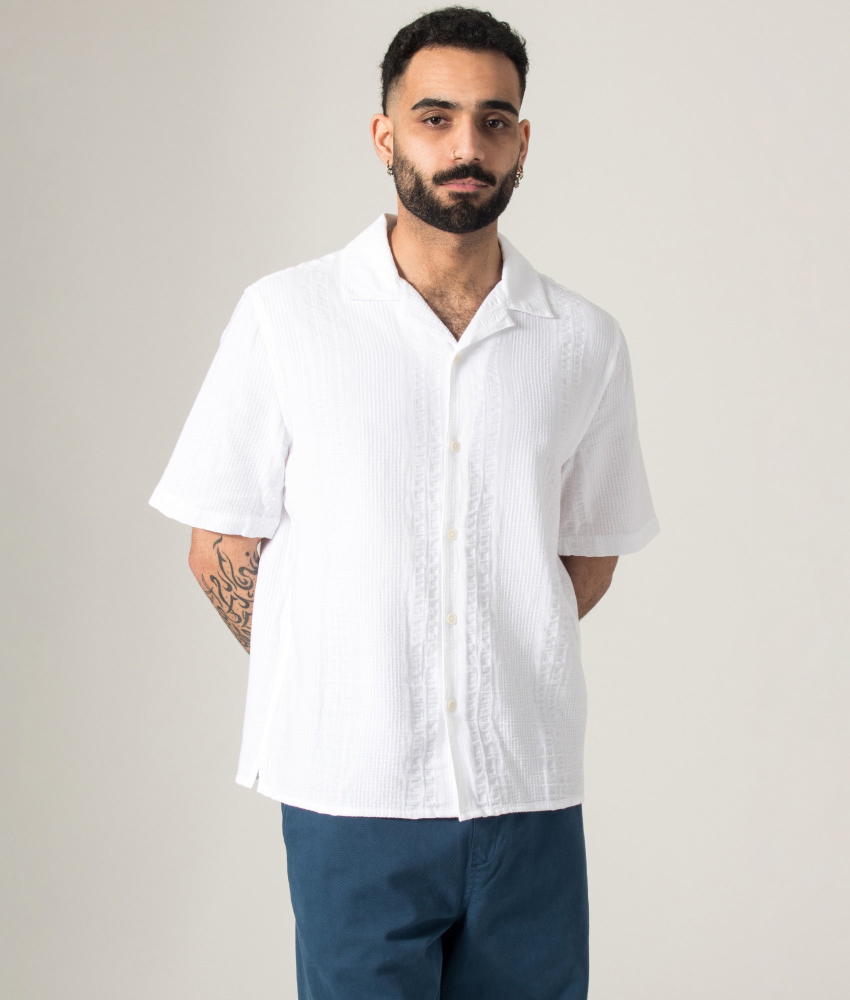 Wax London Didcot Double-Weave Seersucker Short Sleeve Shirt in Ecru at EQVVS Menswear. Model front shot.