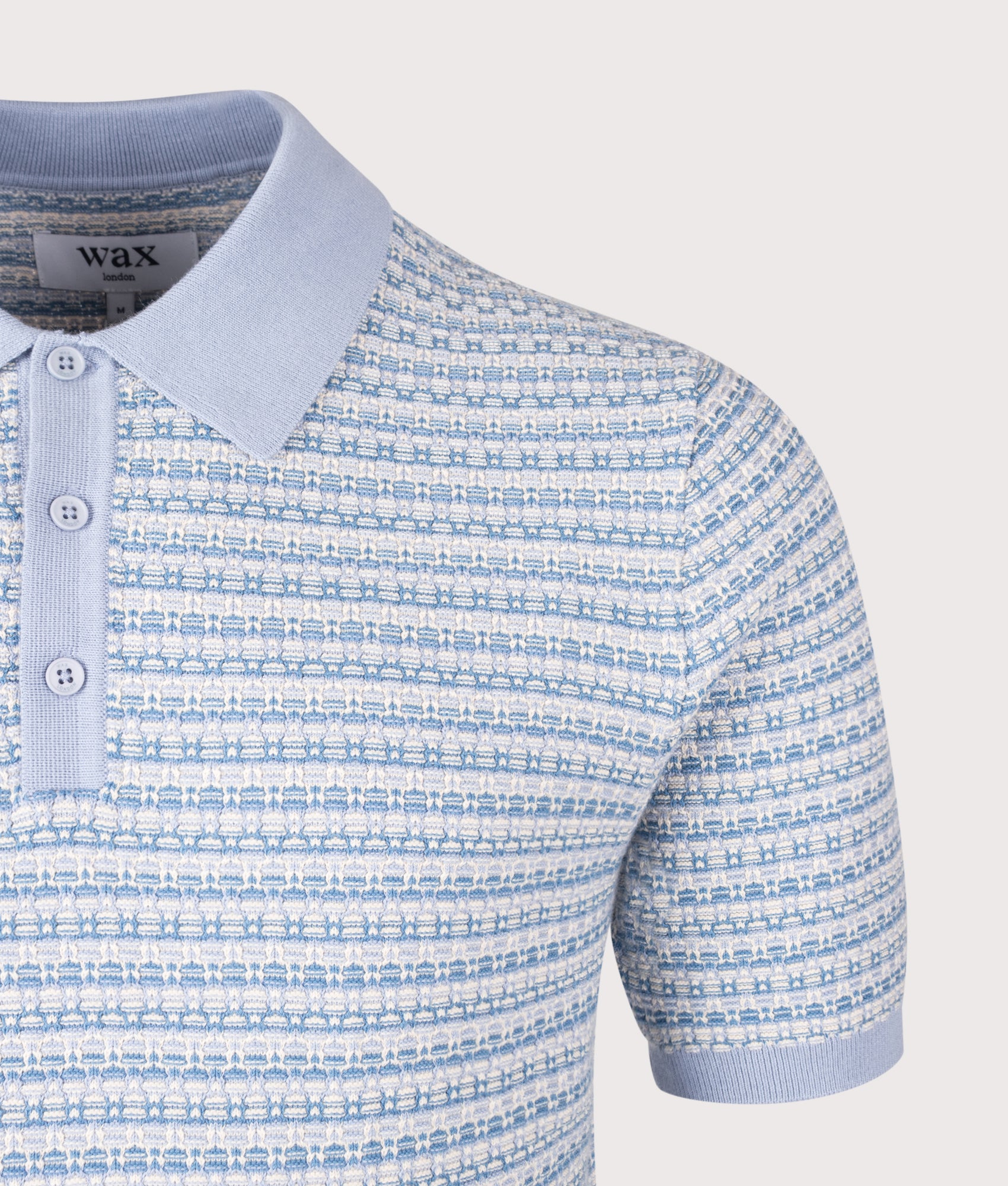 Wax London Naples Mini Geo Polo Shirt in Light Blue at EQVVS Menswear. Detail shot.