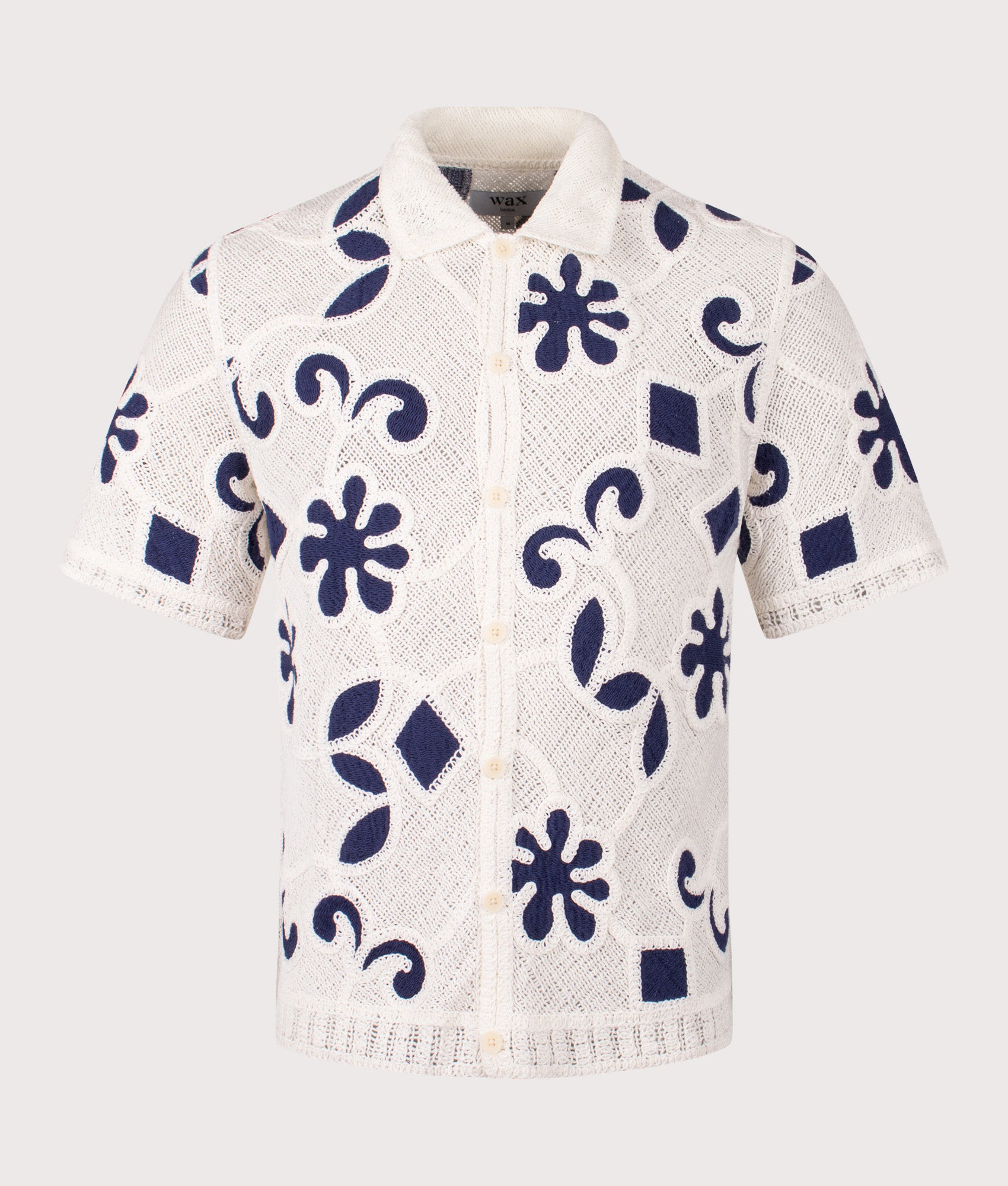 Wax London Porto Doodle Crochet Polo Shirt in Ecru/Dark Blue at EQVVS Menswear. Front shot.