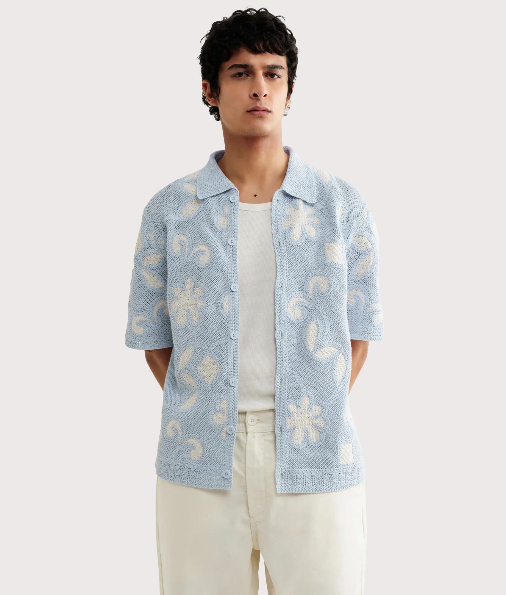 Wax London Porto Doodle Crochet Polo Shirt in Pale Blue and Ecru at EQVVS Menswear. Model front shot.