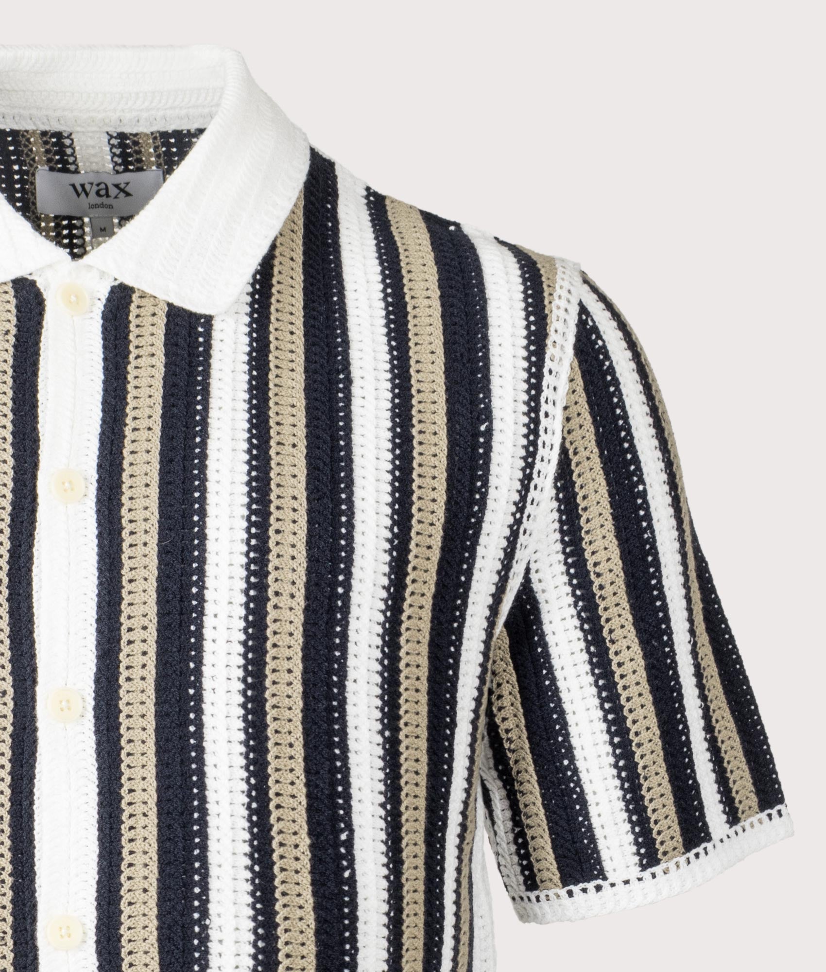 Wax London Porto Stripe Crochet Polo Shirt in Ecru and Black at EQVVS menswear. Material detail shot.