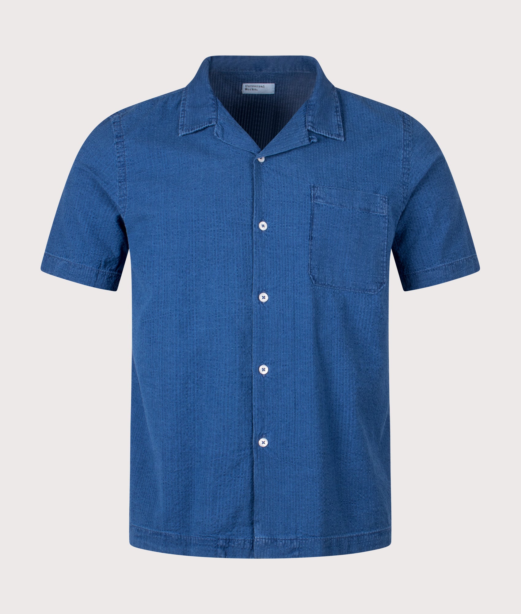 Road Shirt in Washed Indigo by Universal Works. EQVVS Front Angle Shot.