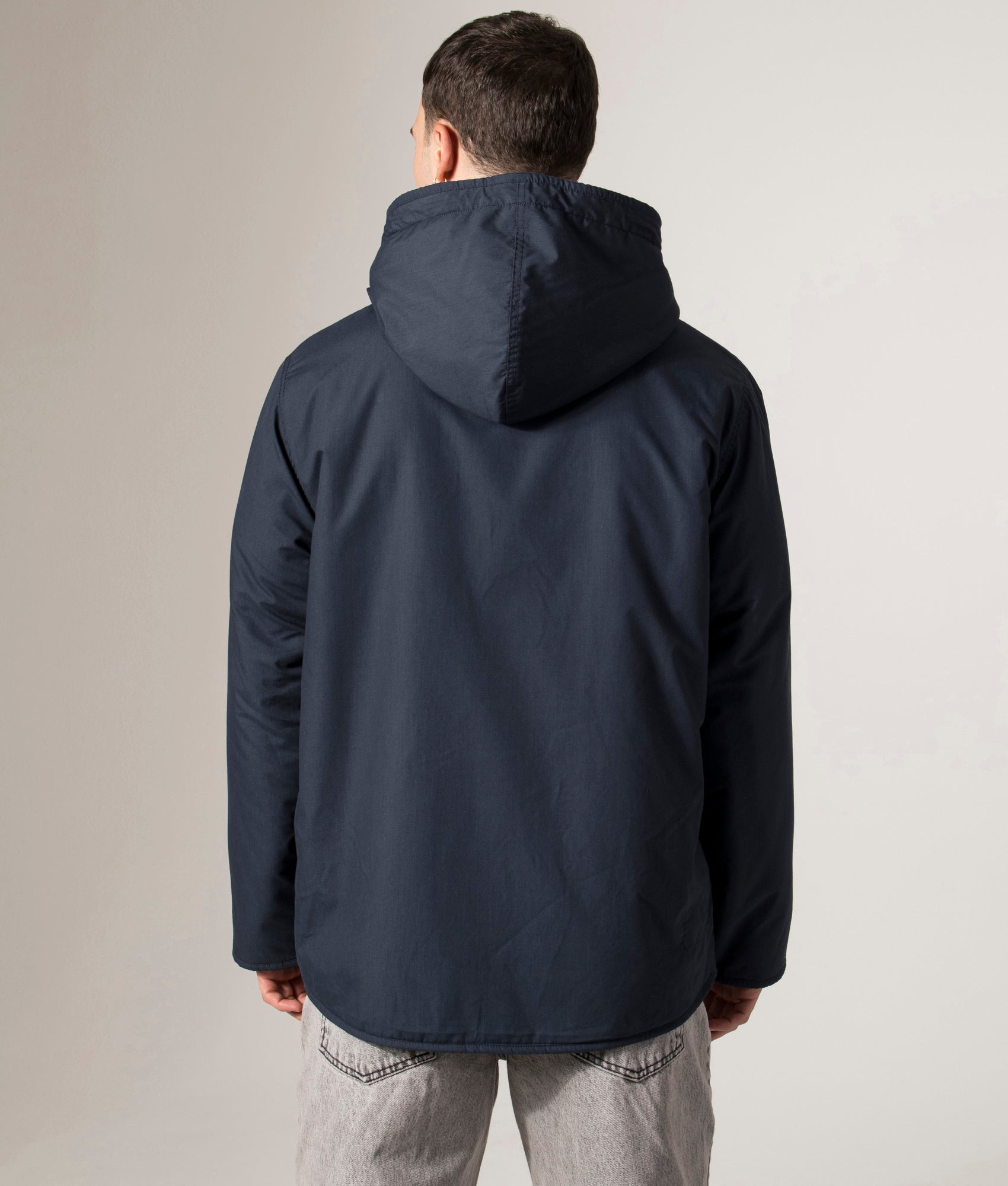 Universal Works Reversible Simple Hooded Jacket in Navy and brown fleece. Front Shot at EQVVS. Back model shot 