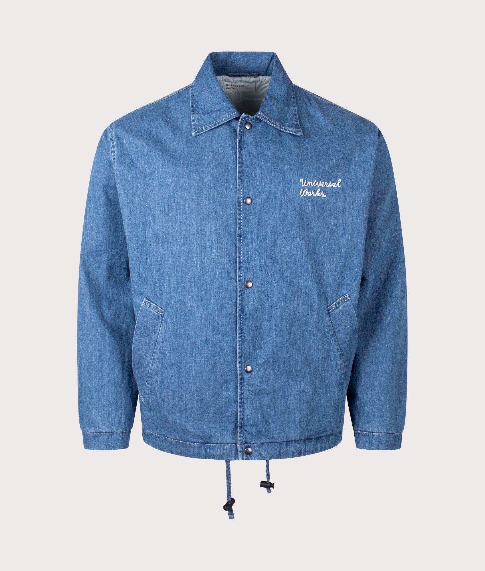 Universal Works Head Coach Jacket in Washed Indigo. Shot at EQVVS. Front shot. 