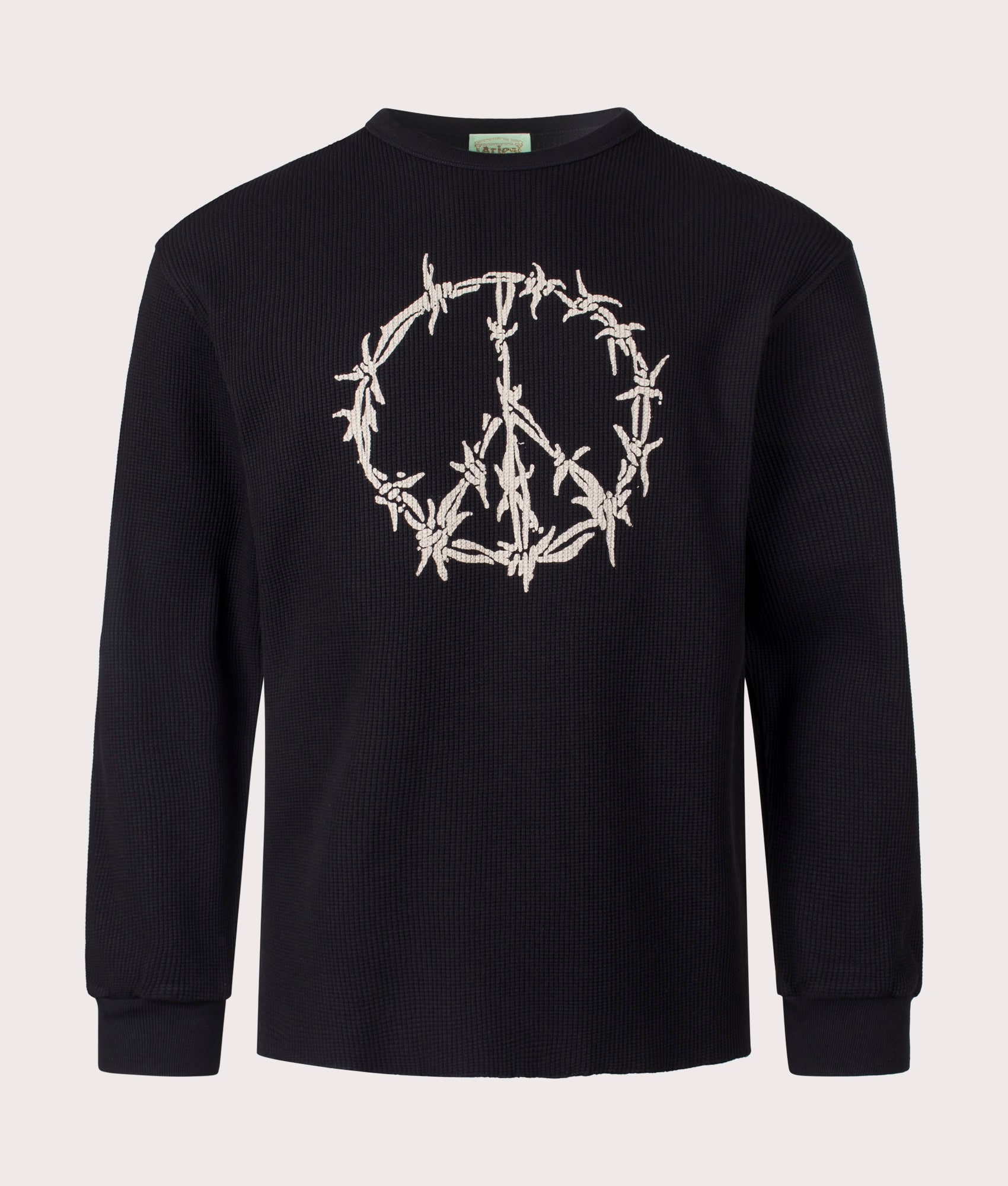 Aries Peace Press Gothic Waffle Long Sleeve T-Shirt in Black. Front Shot at EQVVS.