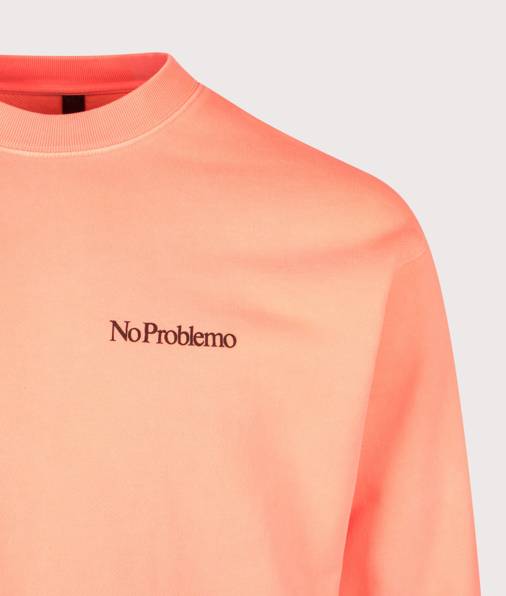 No Problemo Mini Problemo Sweatshirt  in Coral at EQVVS Menswear.Detail shot.