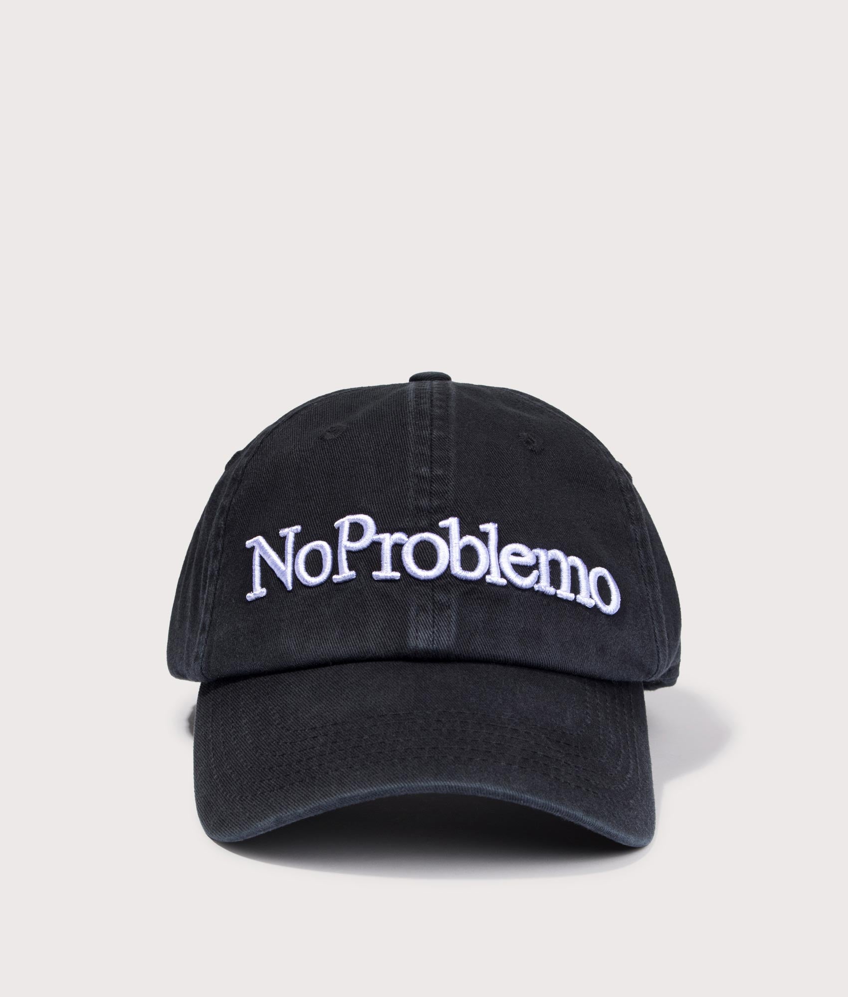 No Problemo Cap in Black by No Problemo. Shot by EQVVS. Front shot.