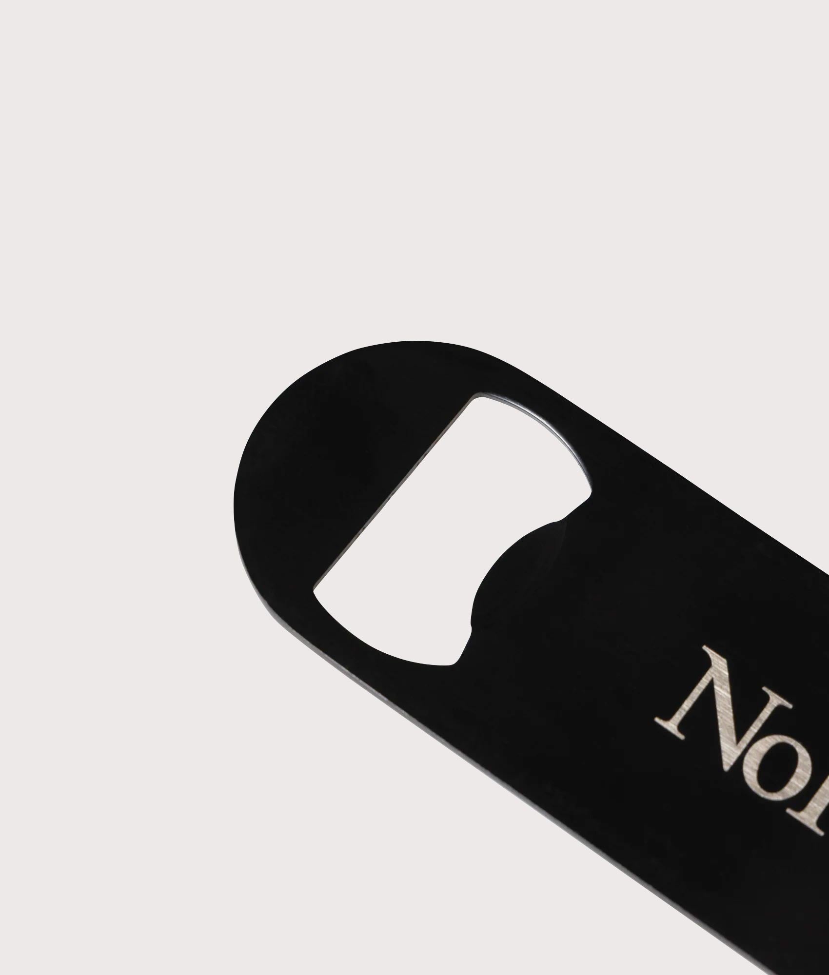 No Problemo Bottle Opener in Black by No Problemo. Shot by EQVVS. Detail shot.